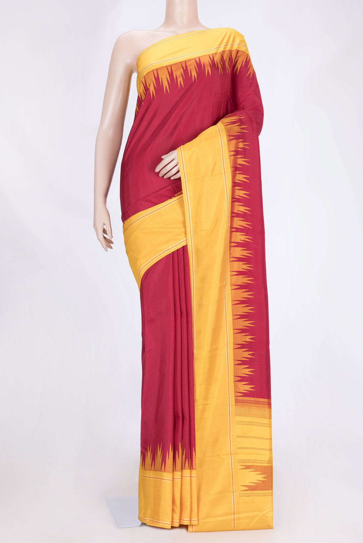 Maroon Dual Tone Kanchipuram Saree with Plain Body and Temple Border.  displayed on a mannequin
