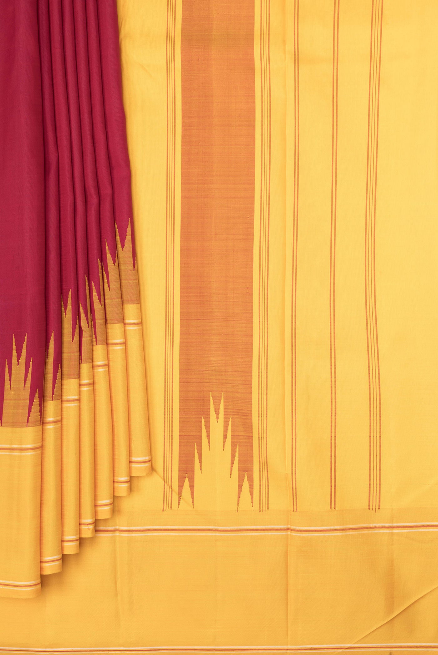Pleats and pallu of Maroon Dual Tone Kanchipuram Saree with Plain Body and Temple Border. 