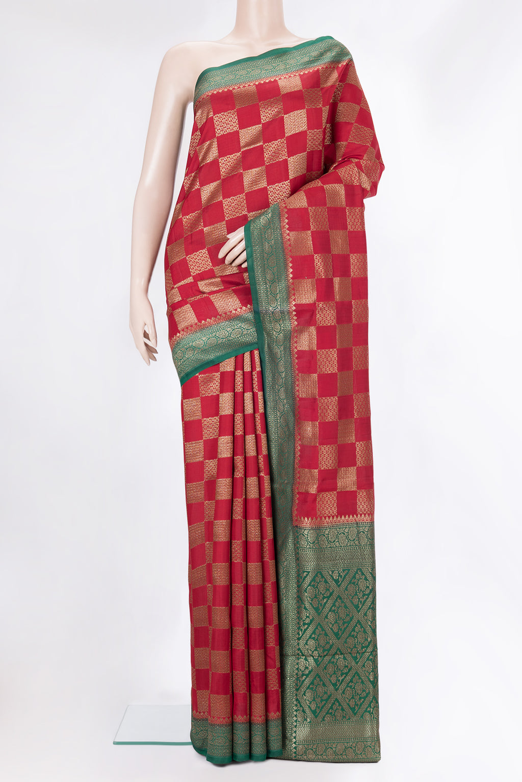 Pure Silk Red Tussar Saree with Zari Brocade on the body and Zari Border.  displayed on a mannequin