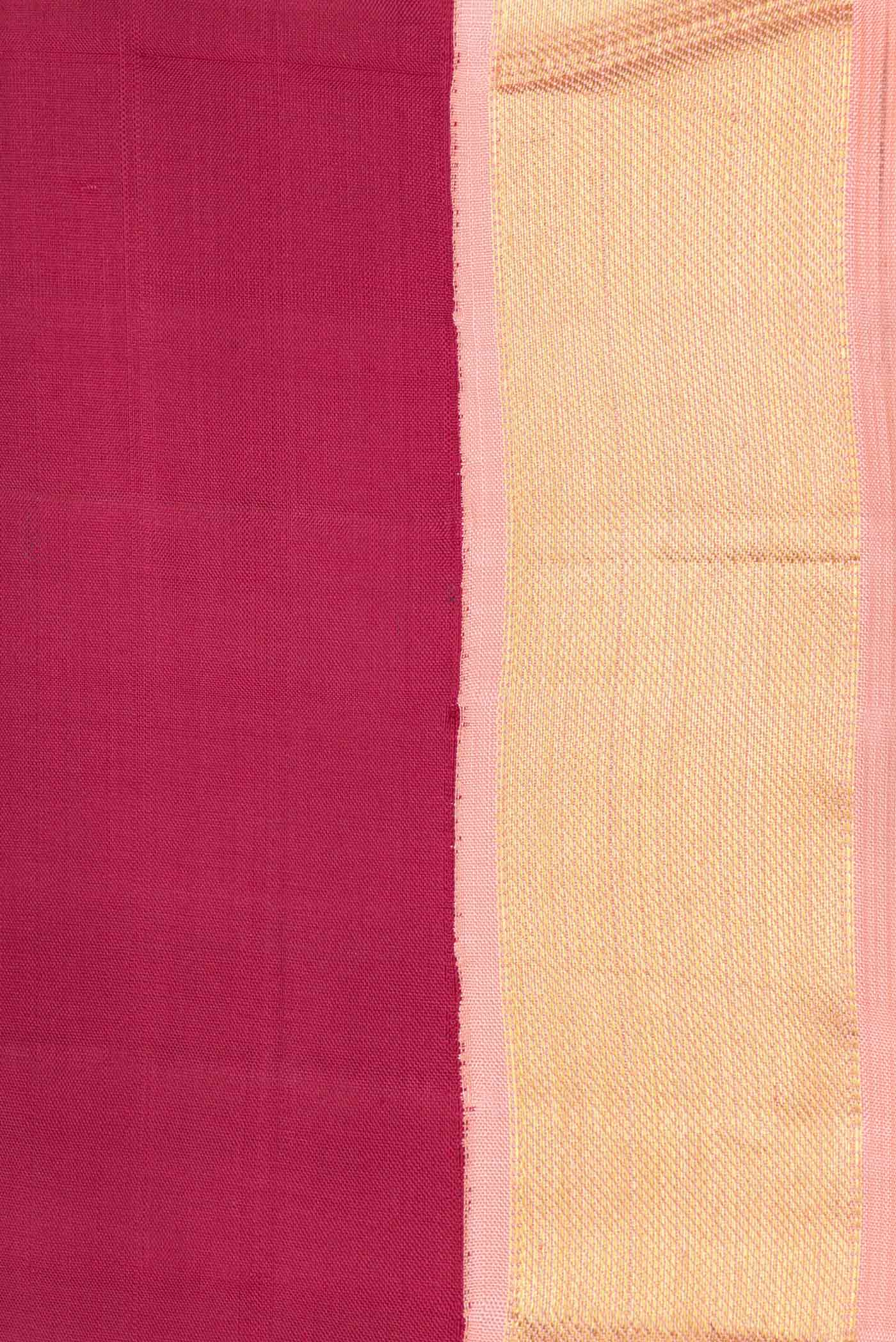 Border image of Maroon Dual Tone Kanchipuram Saree with Plain Body and Zari Border. 