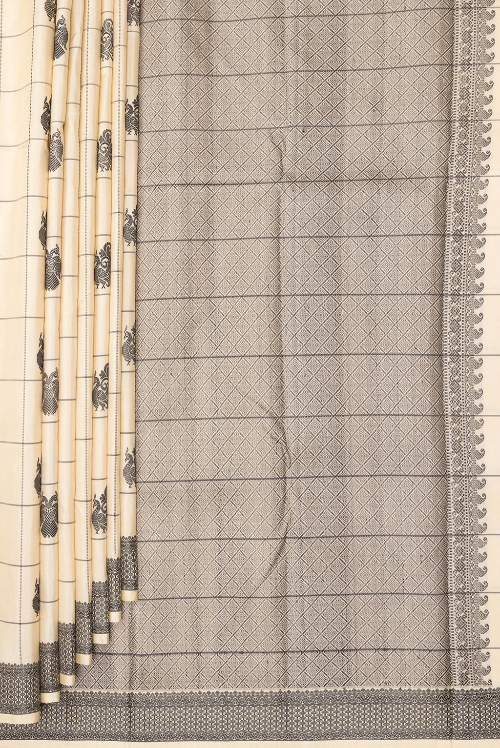 Pleats and pallu of Pure Silk Beige Dual Tone Kanchipuram Saree with Checked design on the body and Thread Border. 