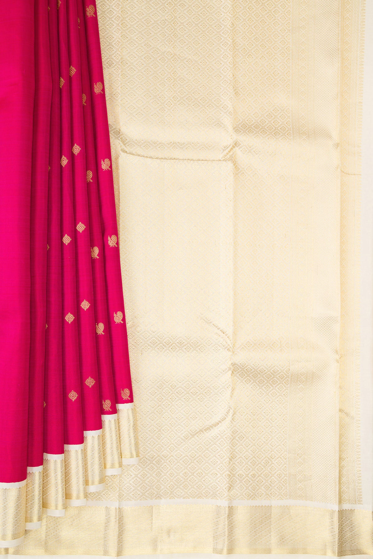 Pleats and pallu of Pure Silk Dark Pink Kanjivaram Saree with Zari Butta on the body and Zari Border. 