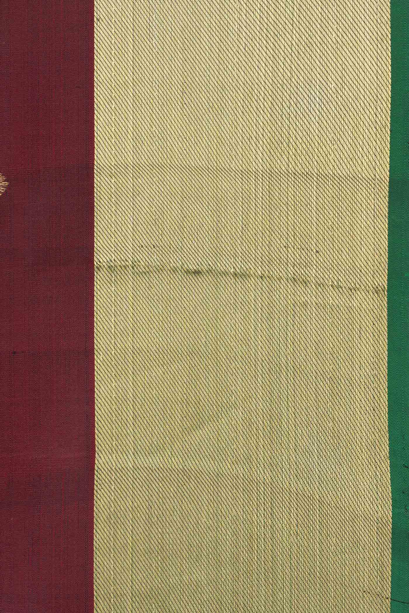 Border image of Maroon Dual Tone Kanchipuram Silk Saree with Zari Butta on the body and Zari Border. 