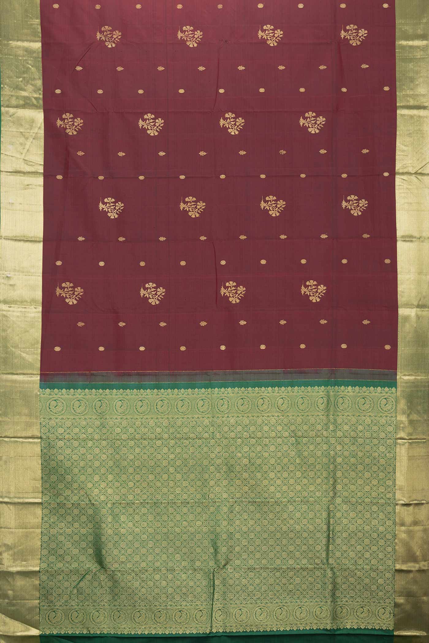 Flat view of Maroon Dual Tone Kanchipuram Silk Saree with Zari Butta on the body and Zari Border. 