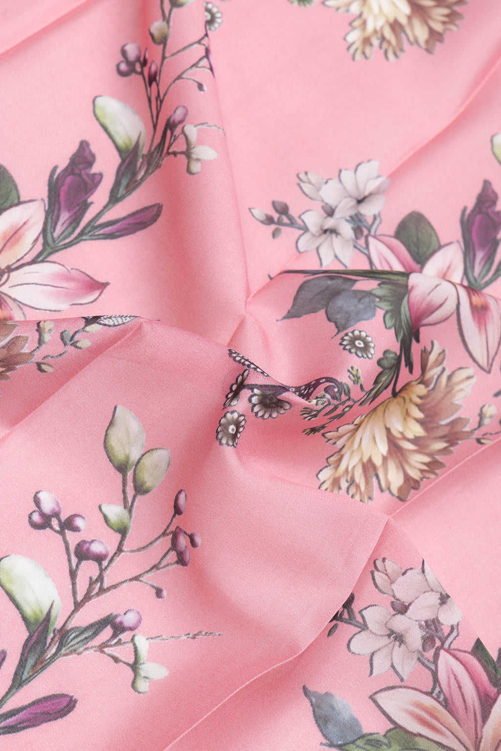 Close up of Pink Mysore Crepe Saree with Printed design on the body and Zari Border.  displaying folds