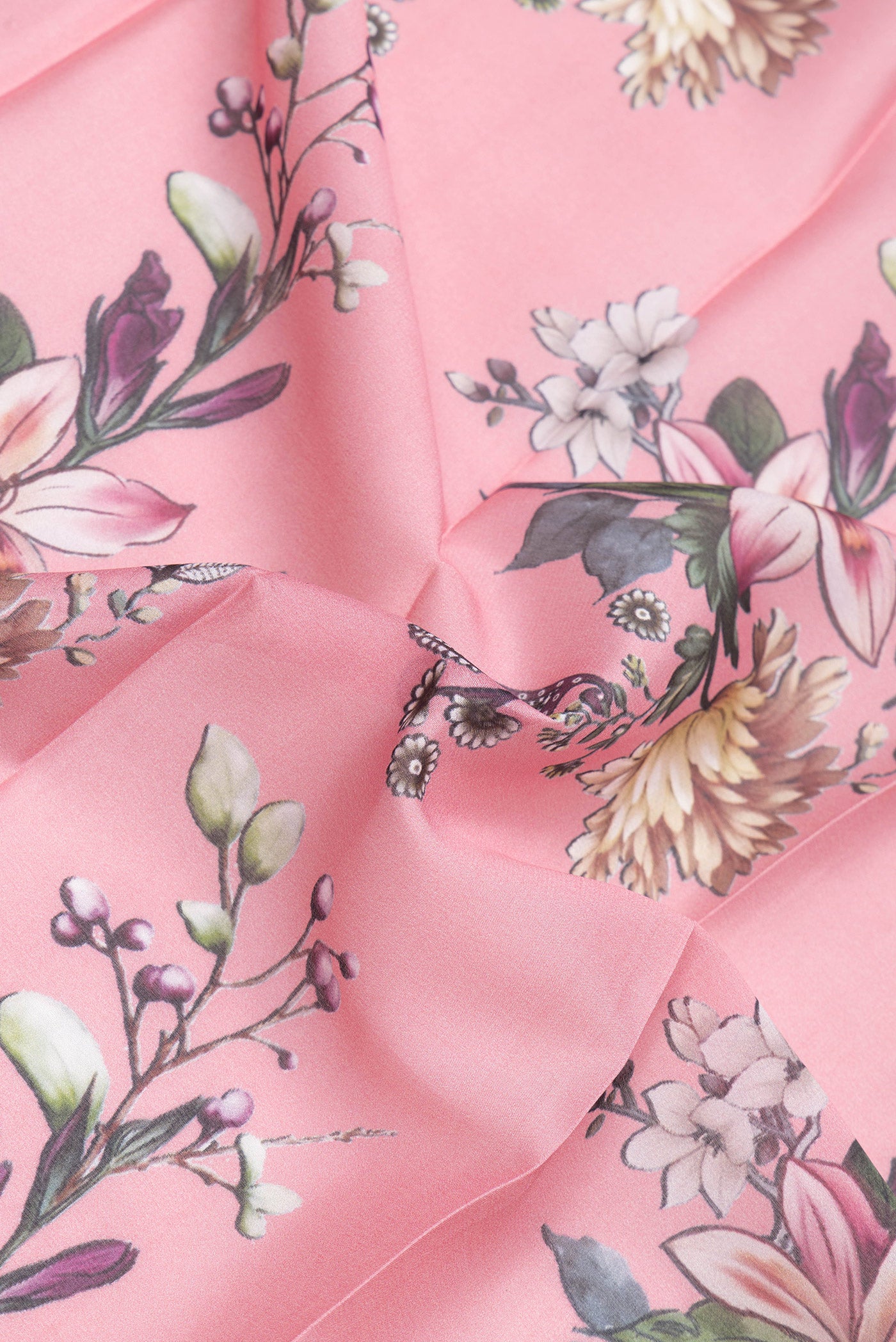 Close up of Pink Mysore Crepe Saree with Printed design on the body and Zari Border.  displaying folds