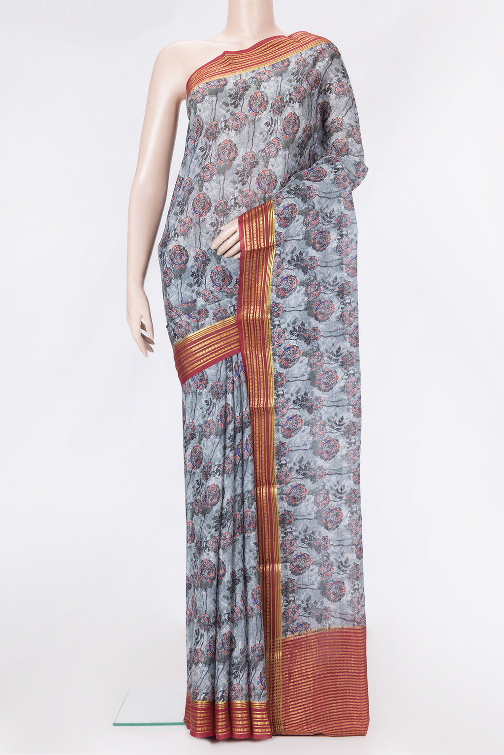 Grey Dual Tone Mysore Silk Saree with Printed design on the body and Zari Border.  displayed on a mannequin