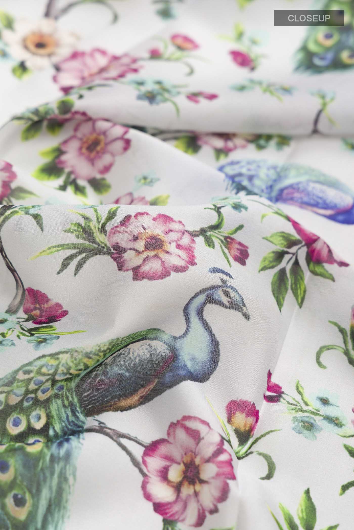 Close up of Grey Mysore Crepe Saree with Printed design on the body and Zari Border displaying folds