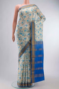 Cream Mysore Crepe Saree with Printed design on the body and Zari Border displayed on a mannequin