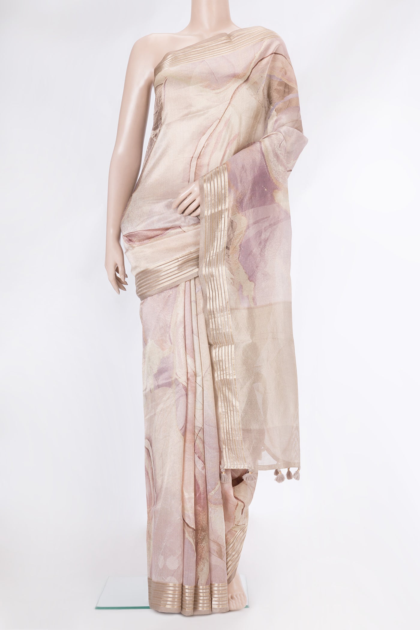 Rose Gold Dual Tone Organza Silk Saree with Printed design on the body and Zari Border.  displayed on a mannequin