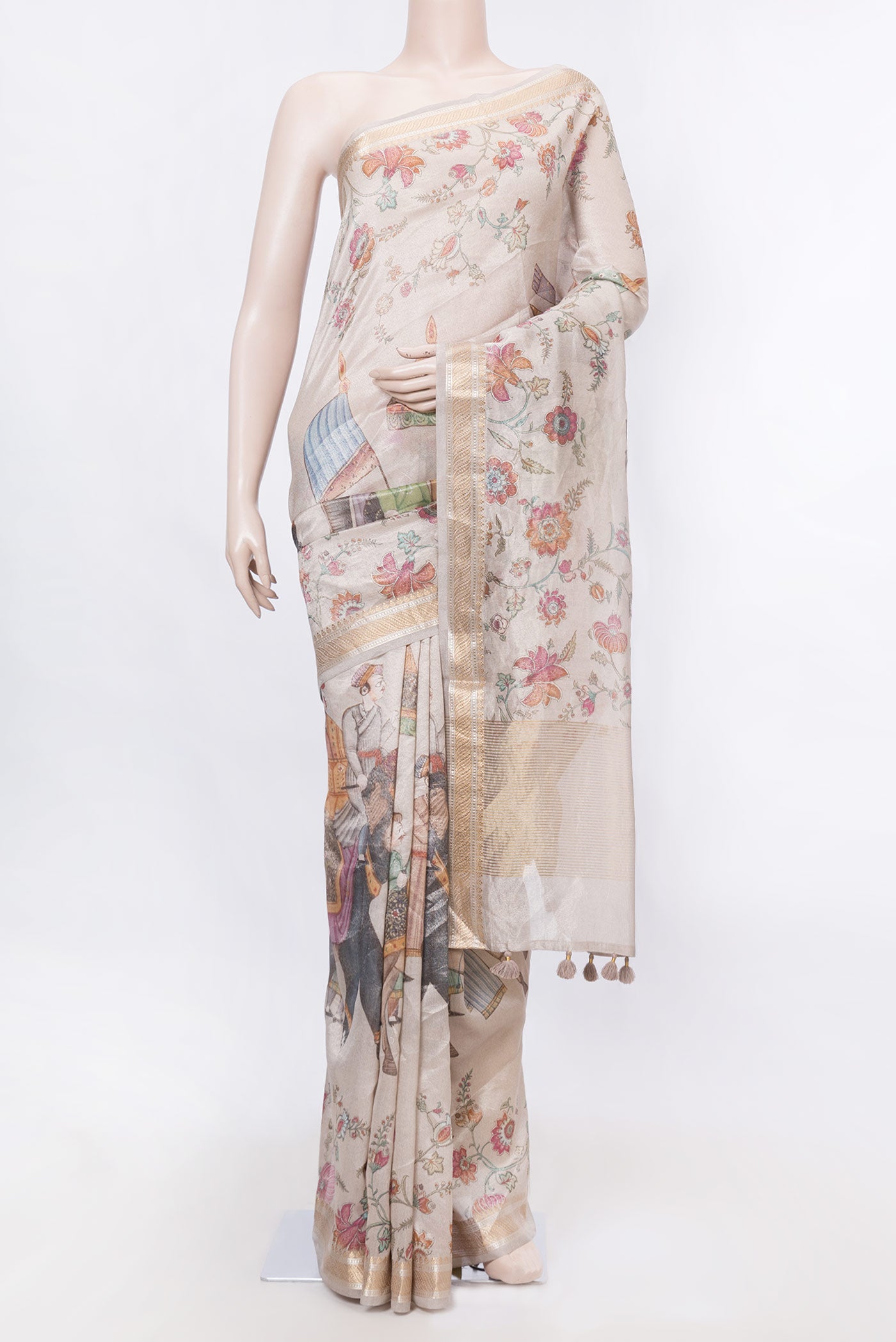 Bronze Dual Tone Organza Silk SareePrinted design on the body and Zari Border displayed on a mannequin