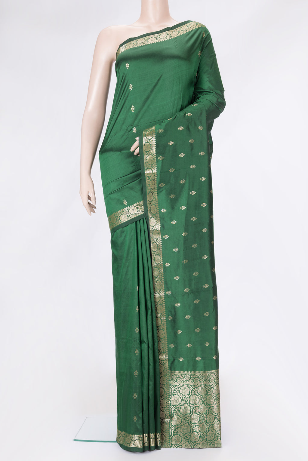 Bottle Green Dual Tone Banarasi Silk Saree with Zari Butta on the body and Zari Border.  displayed on a mannequin