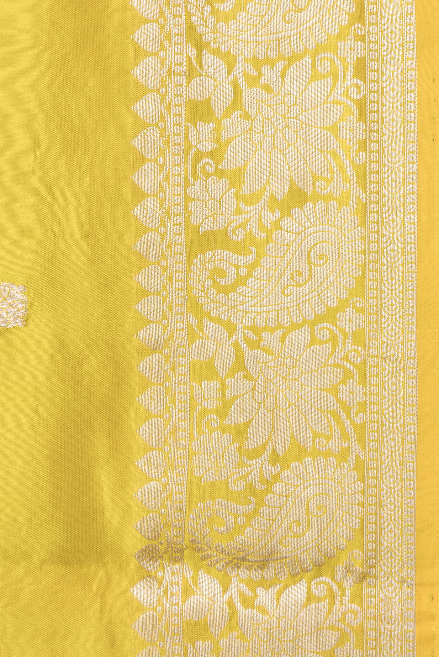 Border image of Yellow Dual Tone Banarasi Silk Saree with Zari Butta on the body and Zari Border. 