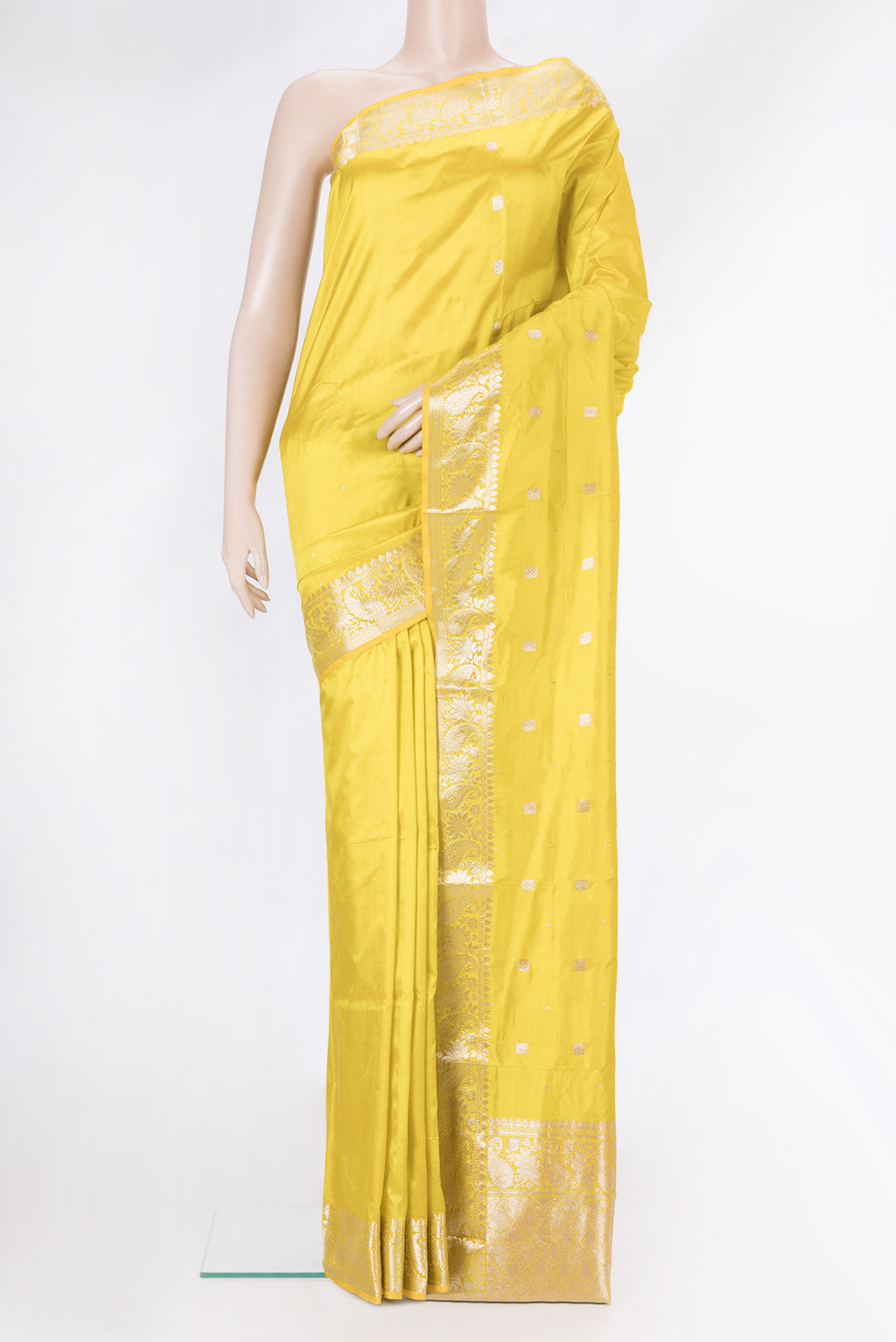 Yellow Dual Tone Banarasi Silk Saree with Zari Butta on the body and Zari Border.  displayed on a mannequin