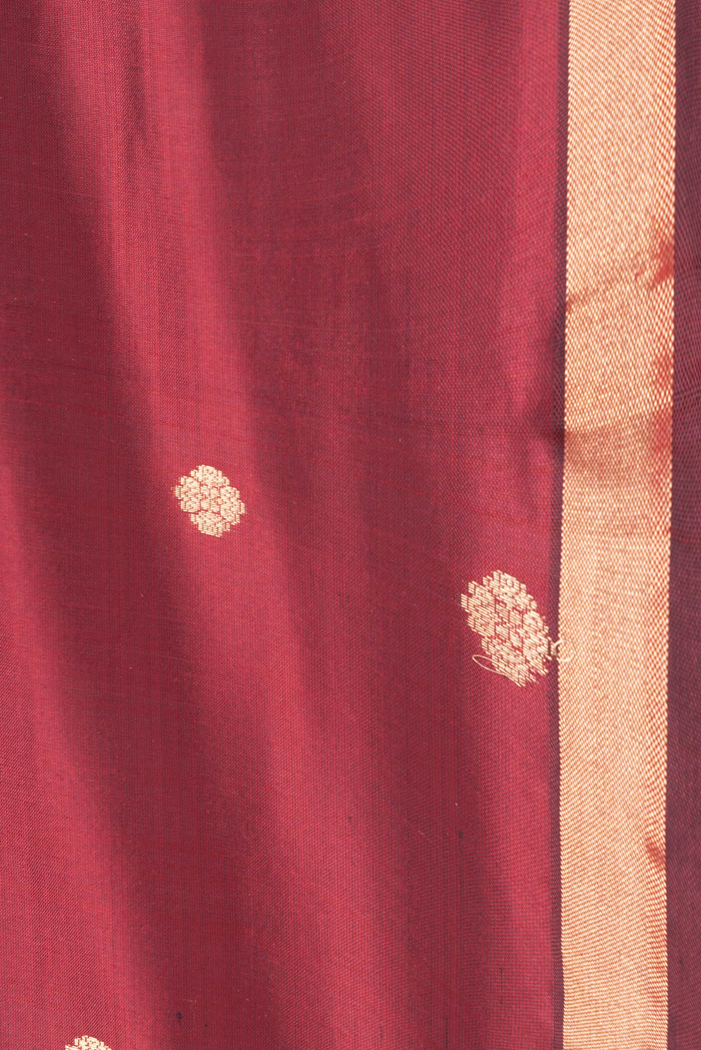 Border image of Maroon Dual Tone Banarasi Silk Saree with Zari Butta on the body and Zari Border. 