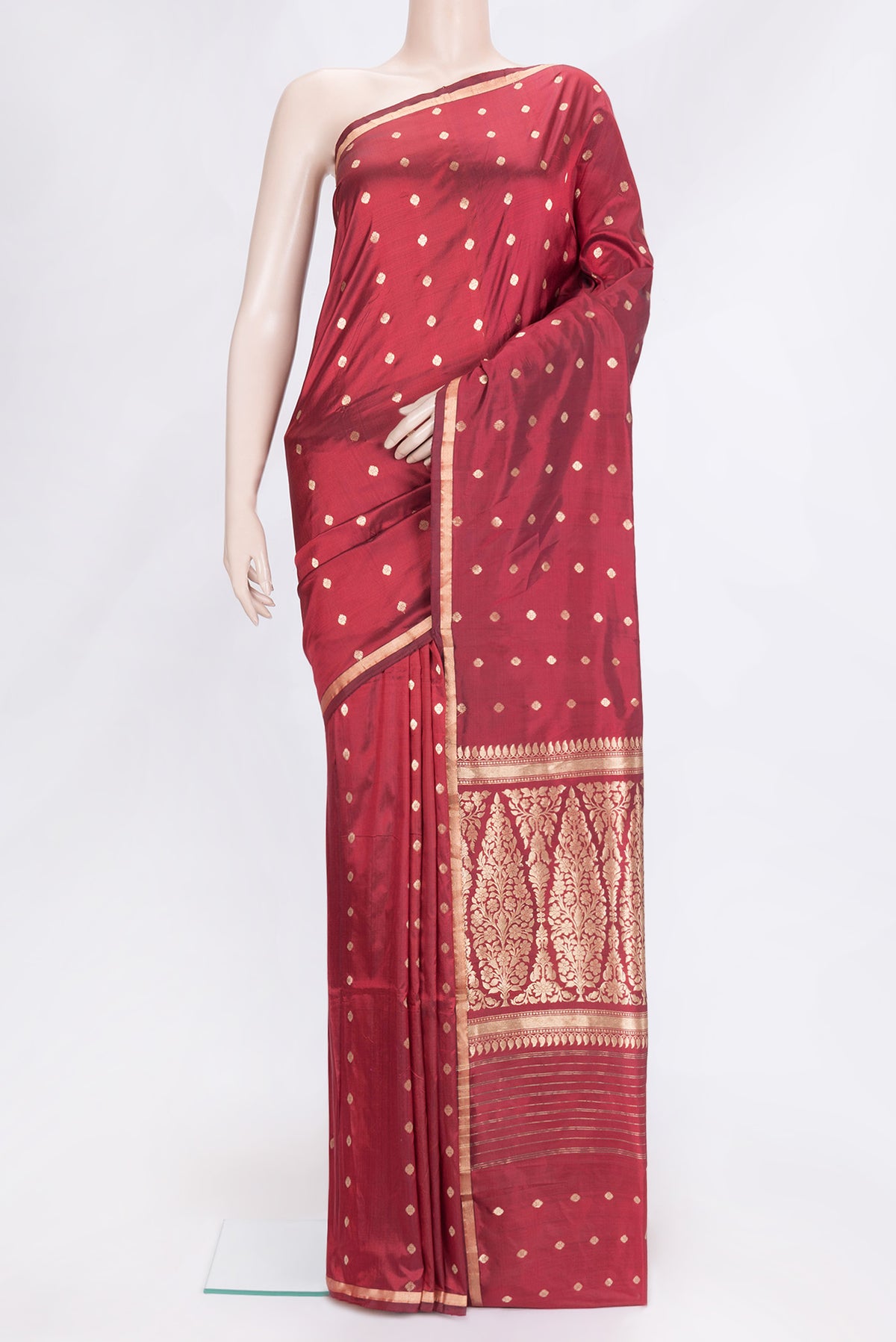 Maroon Dual Tone Banarasi Silk Saree with Zari Butta on the body and Zari Border.  displayed on a mannequin