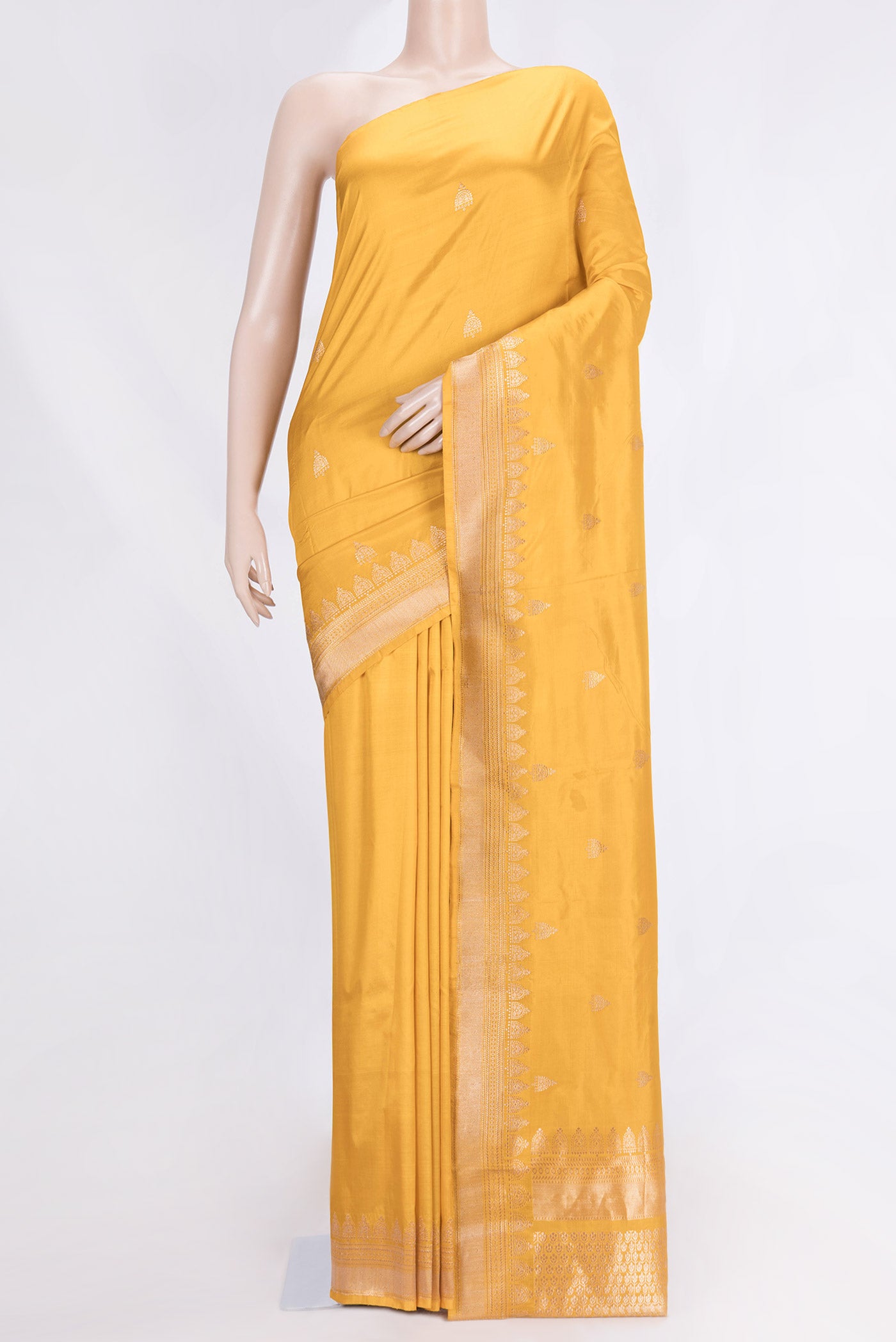 Yellow Dual Tone Banarasi Silk Saree with Zari Butta on the body and Zari Border.  displayed on a mannequin