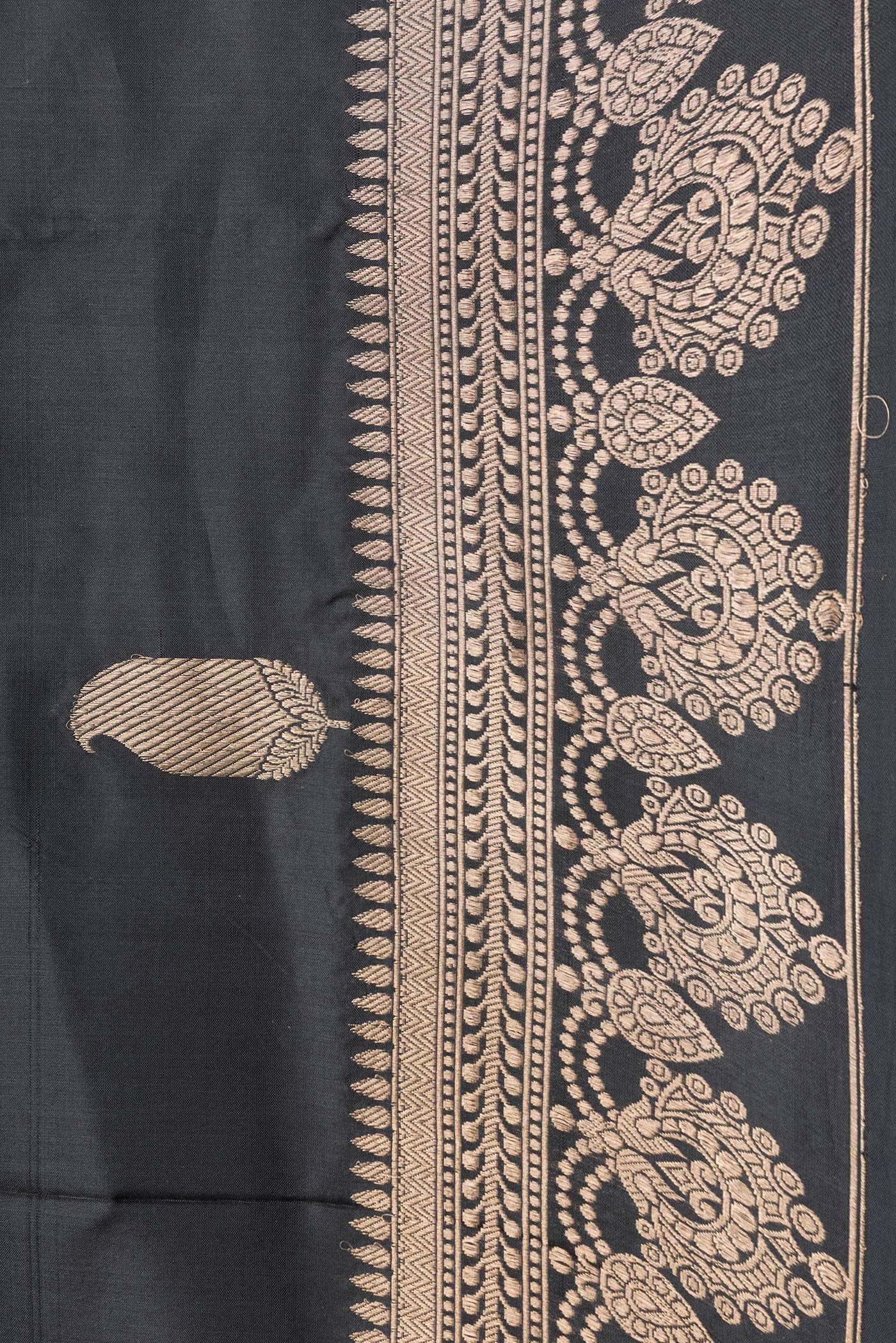 Border image of Black Dual Tone Banarasi Silk Saree with Zari Butta on the body and Zari Border. 