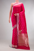 Pink Banarasi Silk Saree with Zari Butta on the body and Zari Border.  displayed on a mannequin