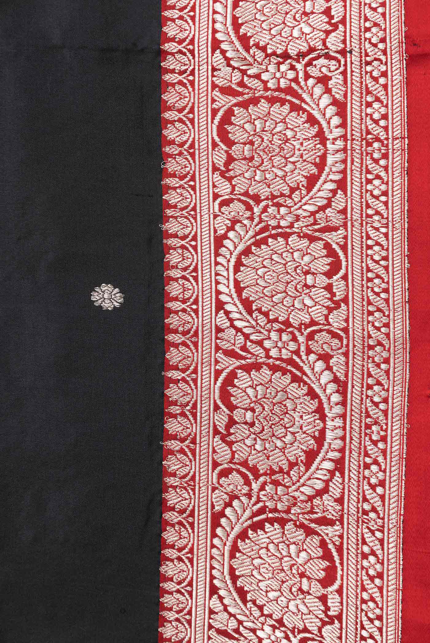 Border image of Black Dual Tone Banarasi Silk Saree with Zari Butta on the body and Zari Border