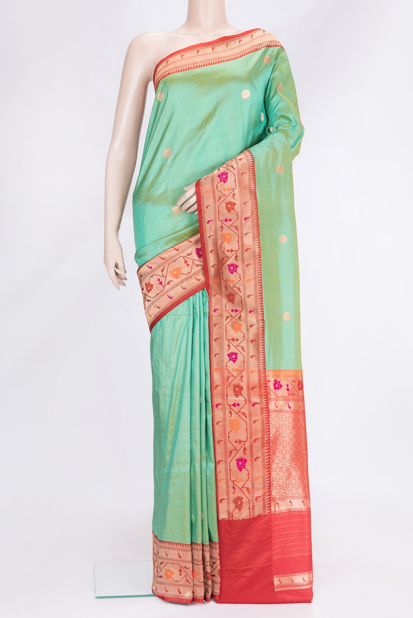 Green Dual Tone Banarasi Silk Saree with Zari Butta on the body and Paithani Border.  displayed on a mannequin
