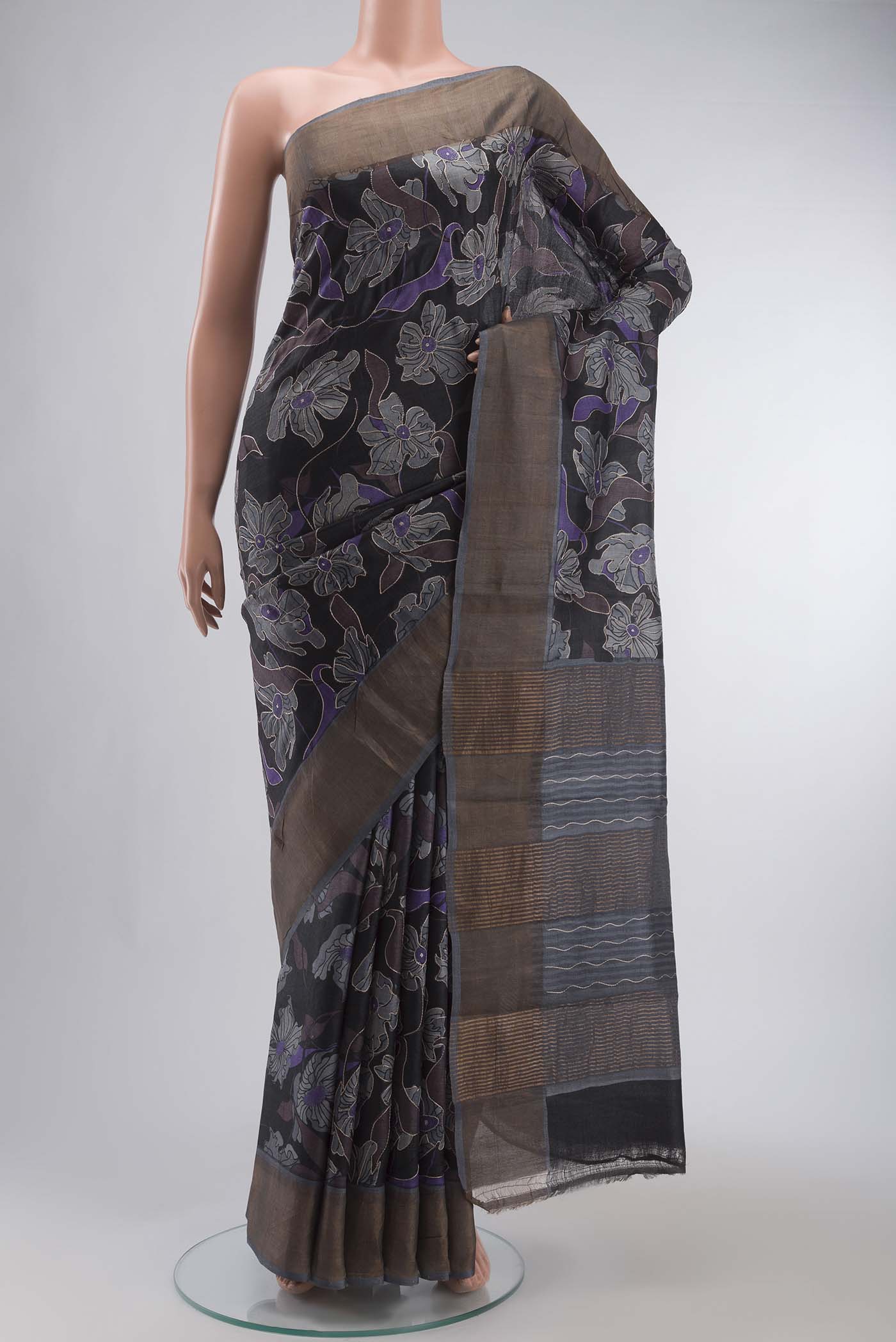 Black Bhagalpuri Tussar Silk Saree with Printed design on the body and Zari Border displayed on a mannequin