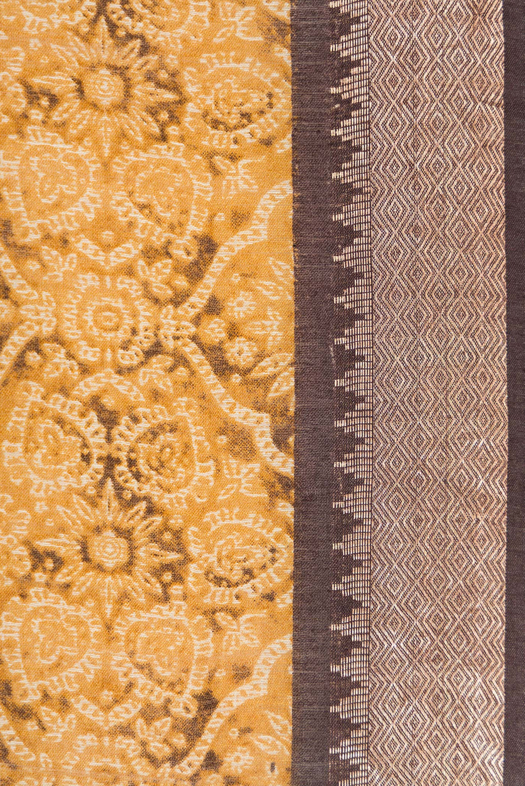 Border image of Mustard Dual Tone Tussar Silk Saree with Printed design on the body and Zari Border. 