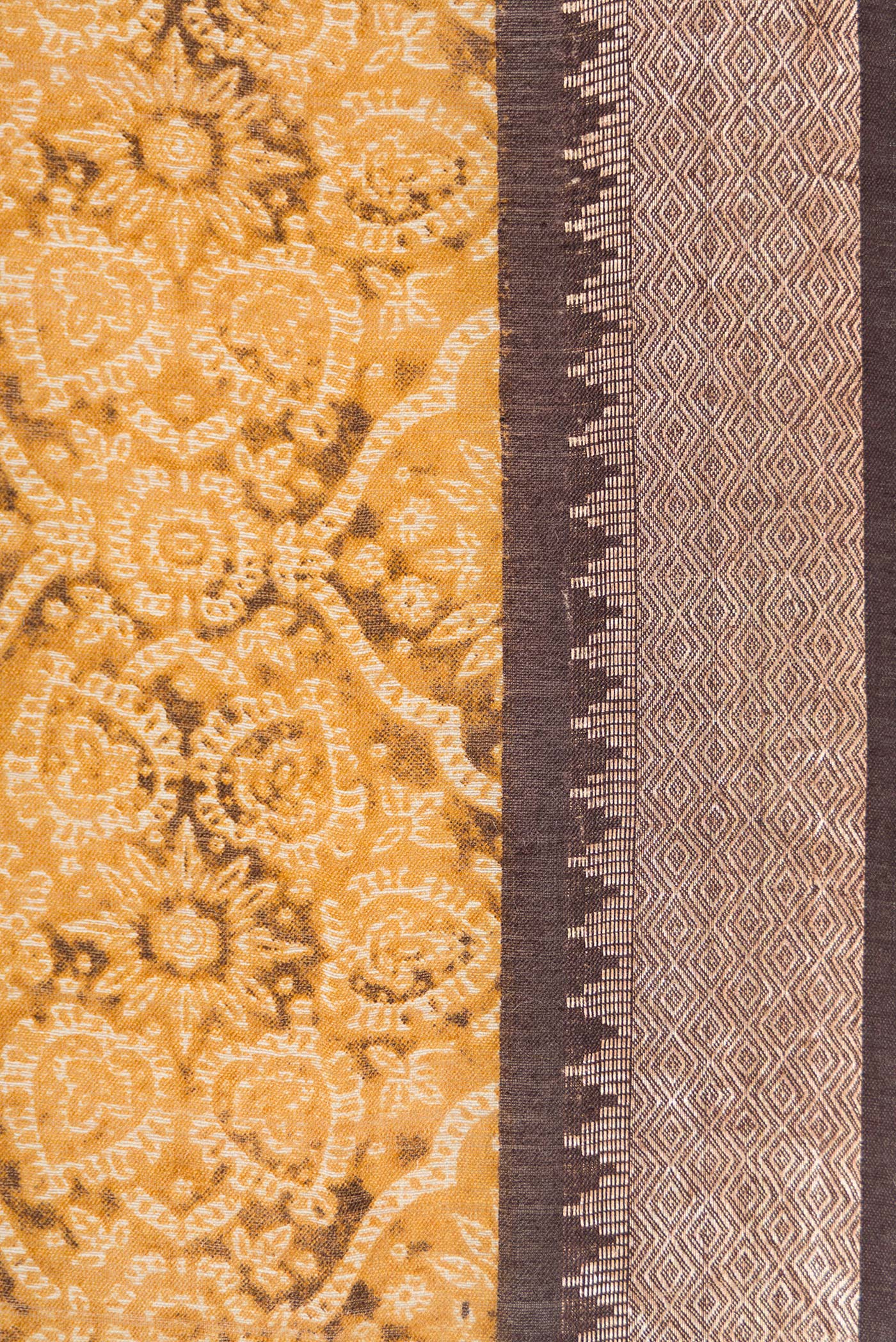 Border image of Mustard Dual Tone Tussar Silk Saree with Printed design on the body and Zari Border. 