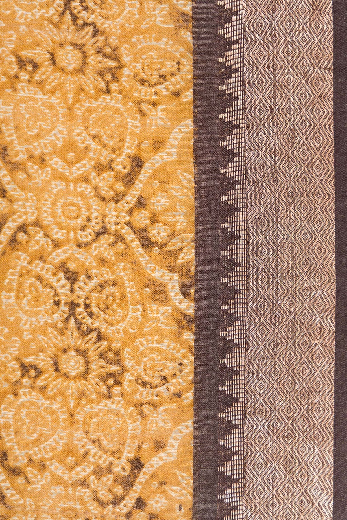 Border image of Mustard Dual Tone Tussar Silk Saree with Printed design on the body and Zari Border. 