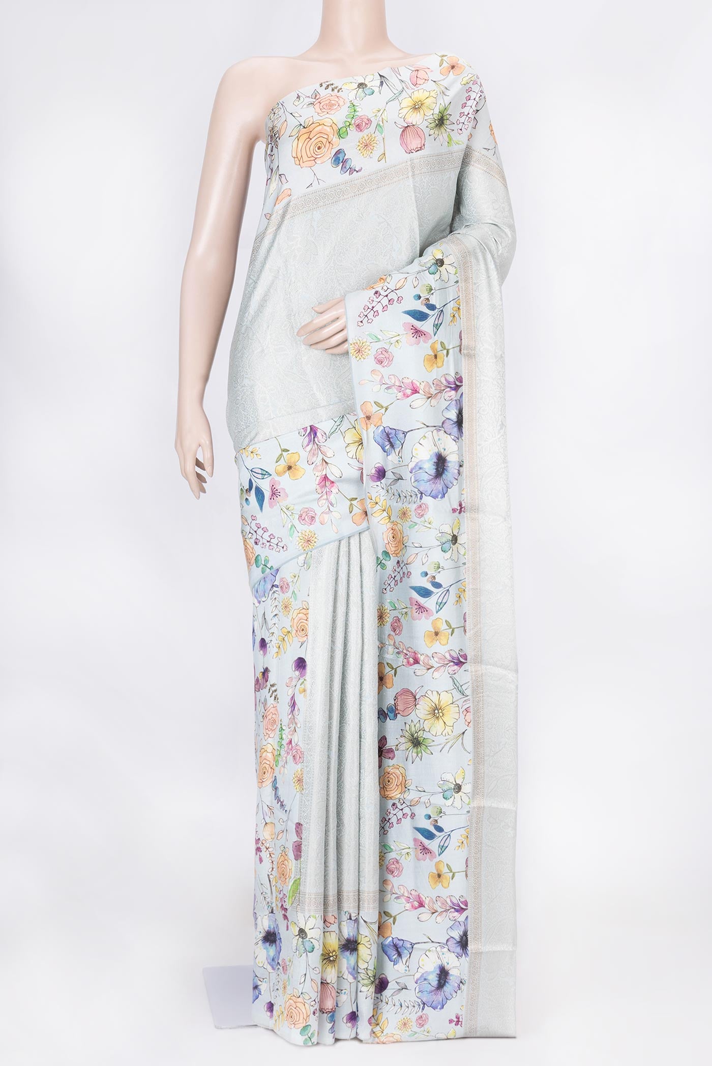 Grey Dual Tone Tussar Saree with Zari Brocade on the body and Fancy Border displayed on a mannequin