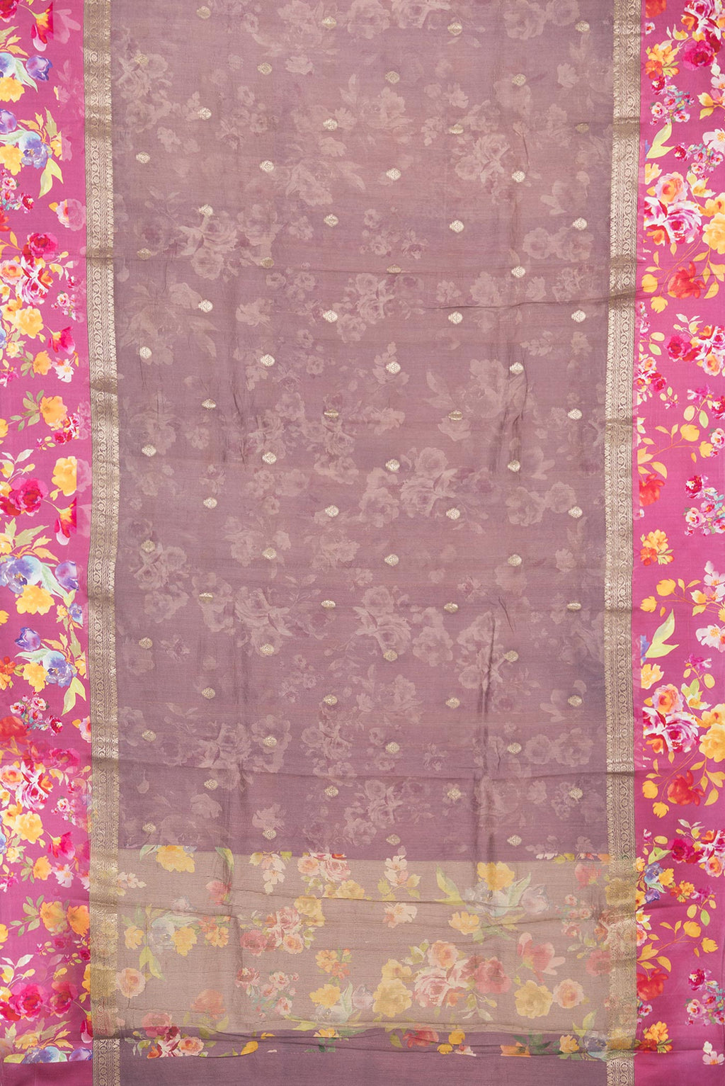 Flat view of Pure Silk Mauve Tussar Saree with Zari Butta on the body and Fancy Border. 