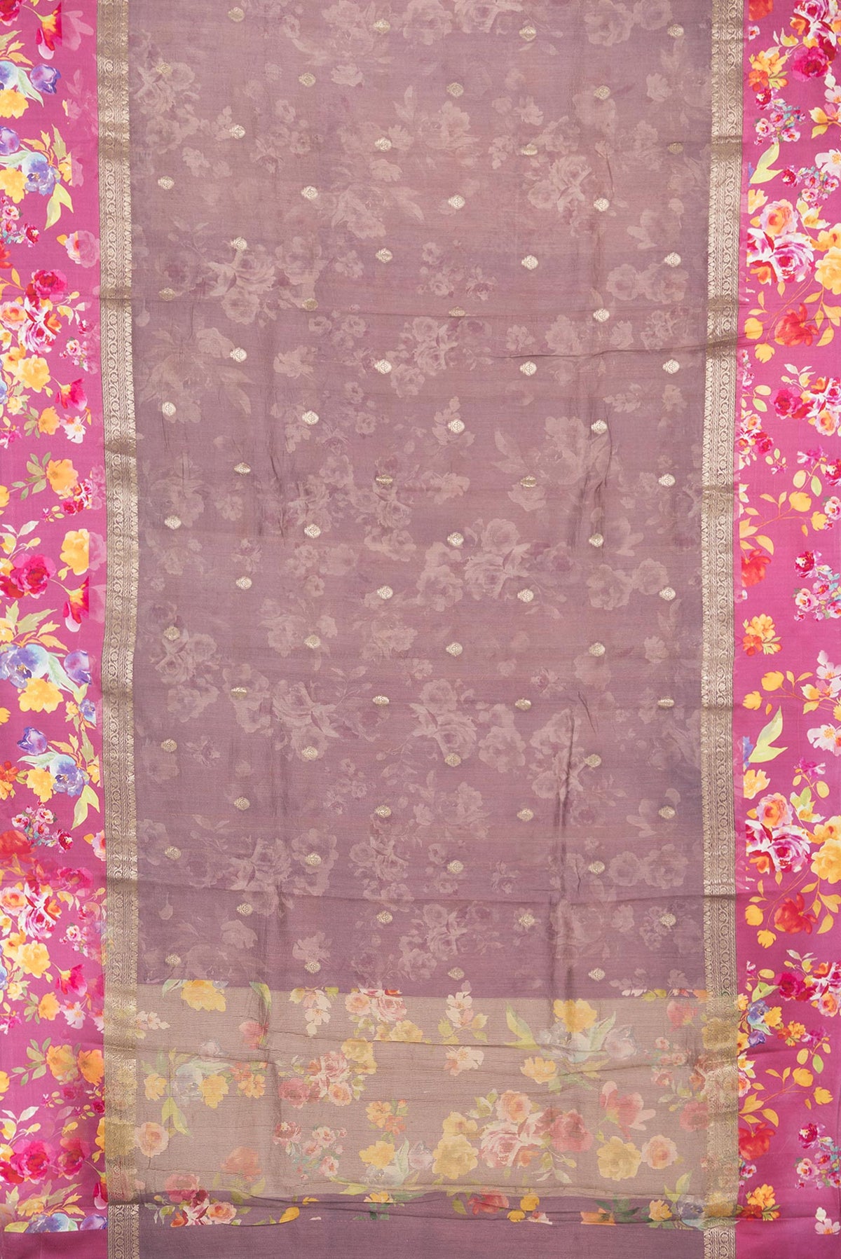 Flat view of Pure Silk Mauve Tussar Saree with Zari Butta on the body and Fancy Border. 