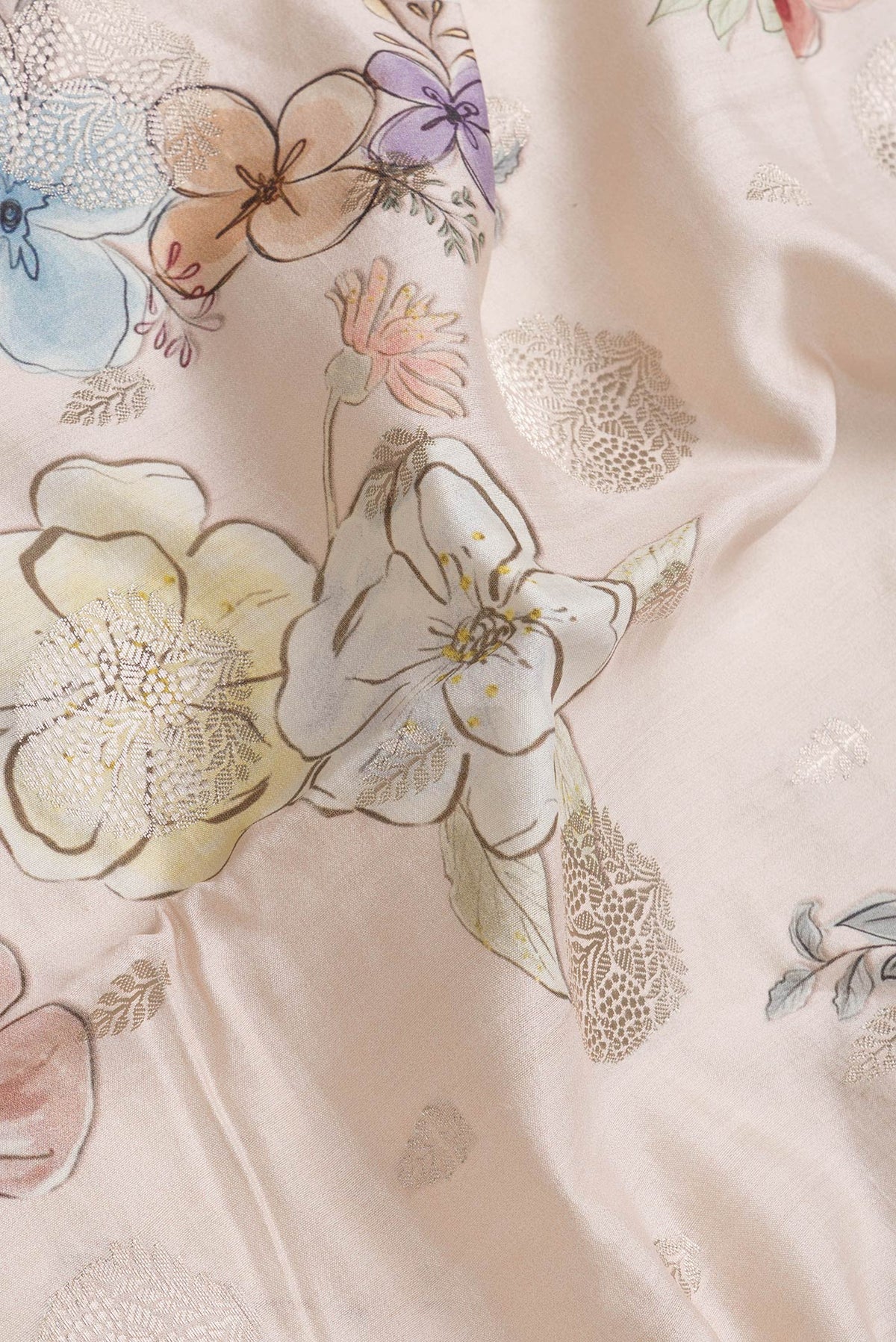 Close up of Rose Gold Dual Tone Tussar Silk Saree with Zari Butta on the body and Zari Border.  displaying folds