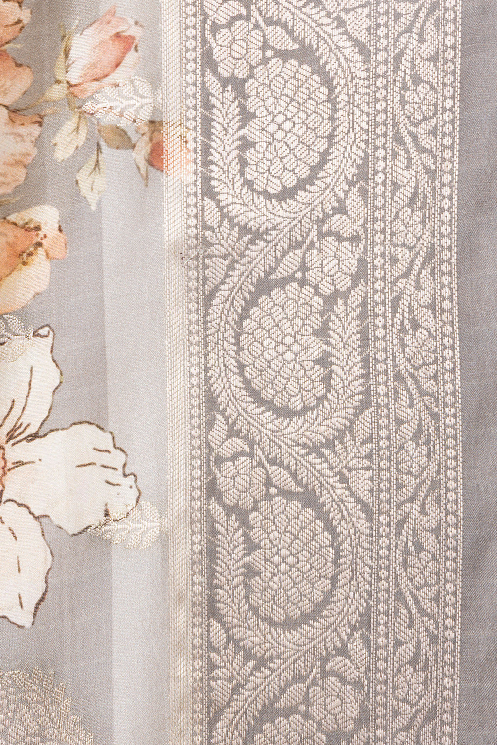 Border image of Grey Dual Tone Tussar Silk Saree with Printed design on the body and Zari Border. 