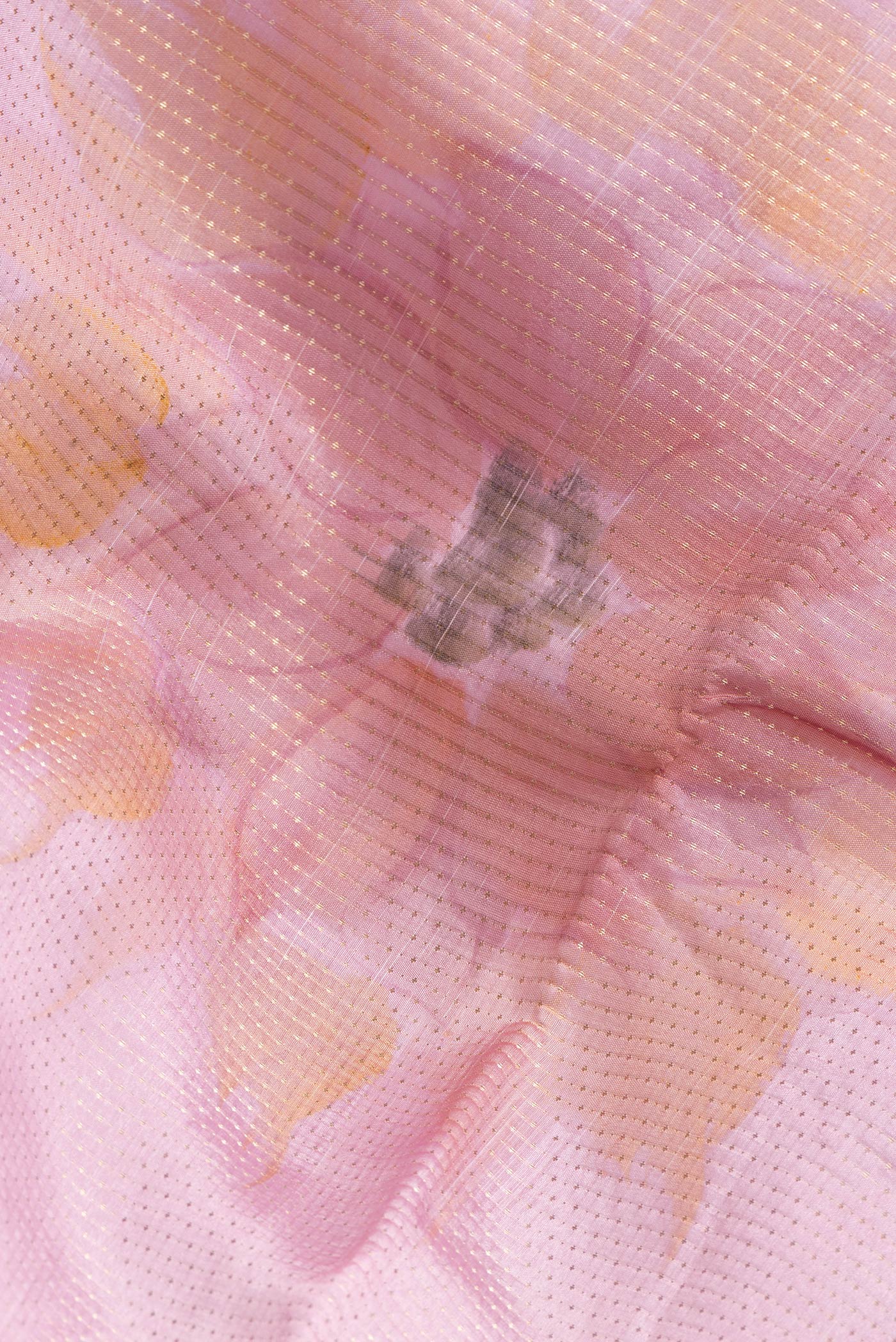 Close up of Pink Dual Tone Tussar Silk Saree with Zari Brocade on the body and Zari And Thread Border.  displaying folds