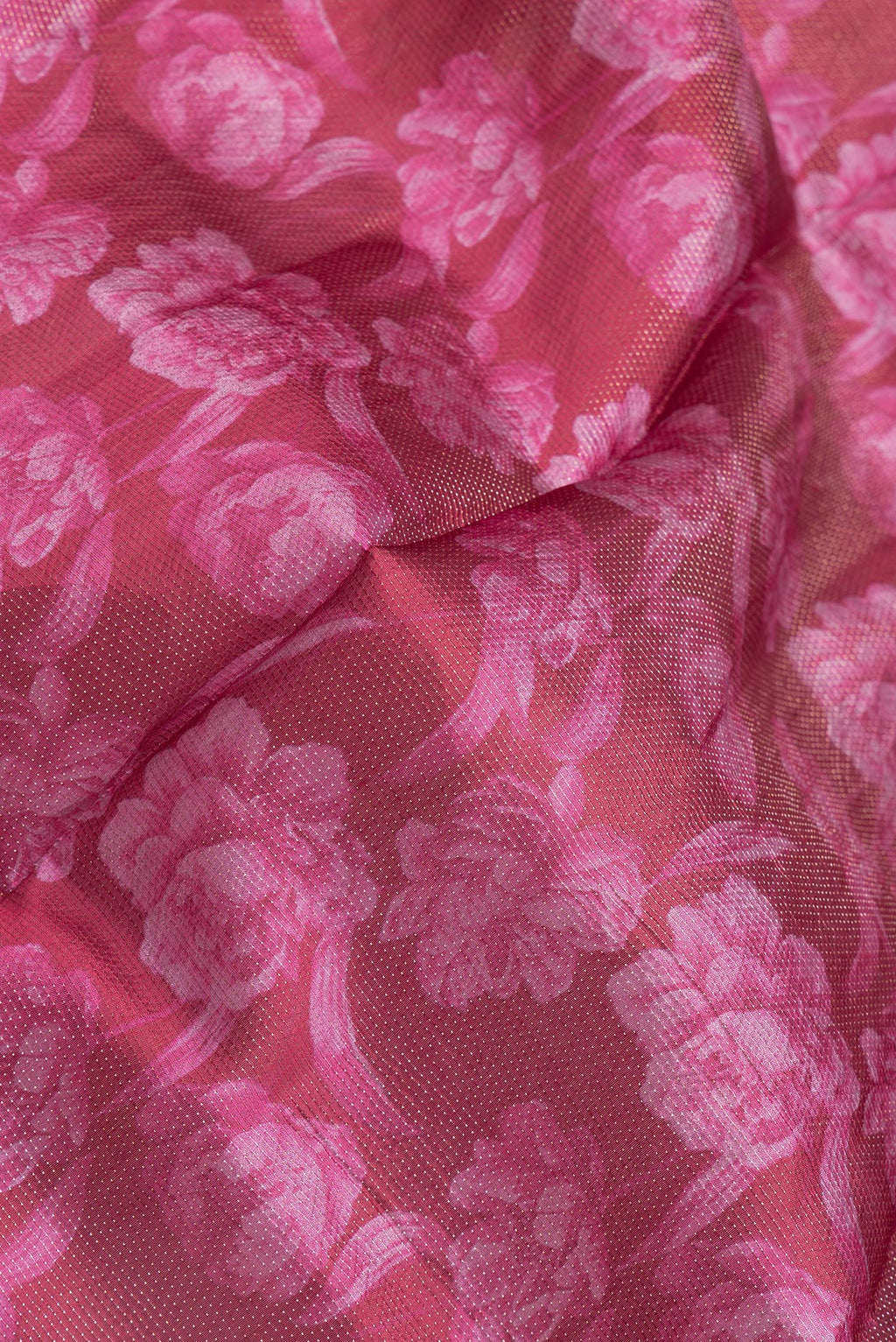 Close up of Maroon Dual Tone Tussar Silk Saree with Printed design on the body and Zari Border.  displaying folds