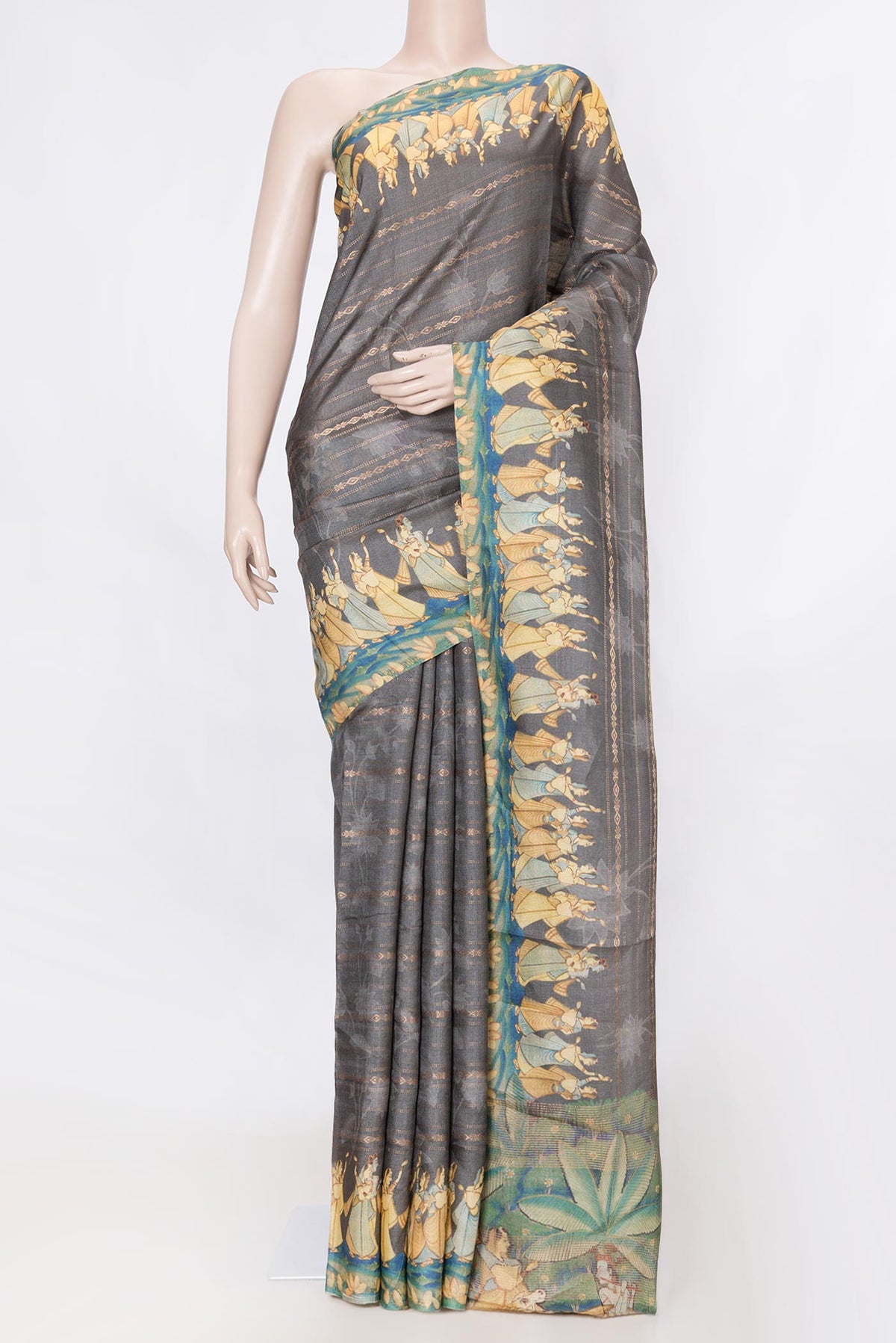 Grey Dual Tone Tussar Silk SareePrinted design on the body and Zari Border displayed on a mannequin