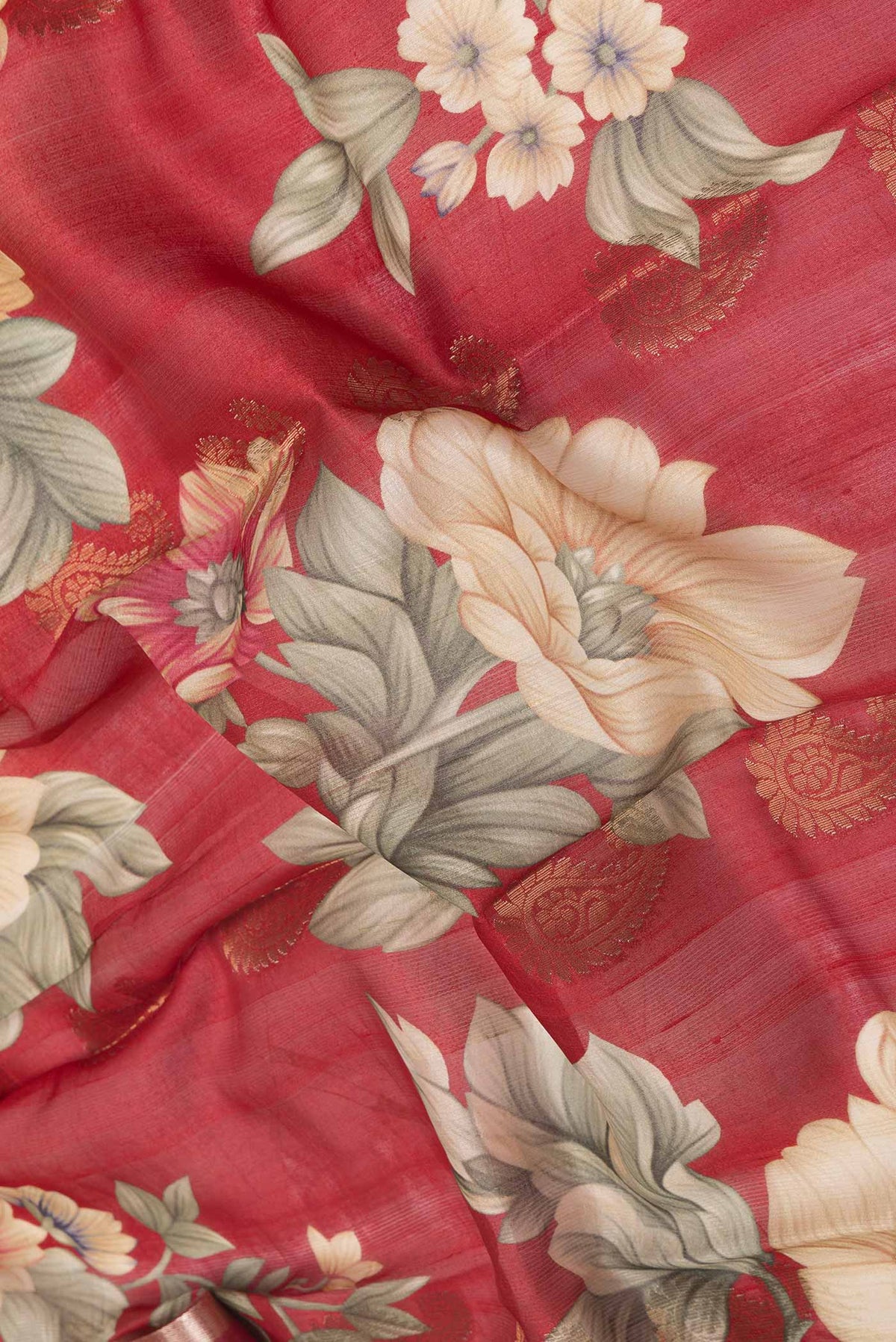 Close up of Red Dual Tone Tussar Silk SareePrinted design on the body and Zari Border displaying folds
