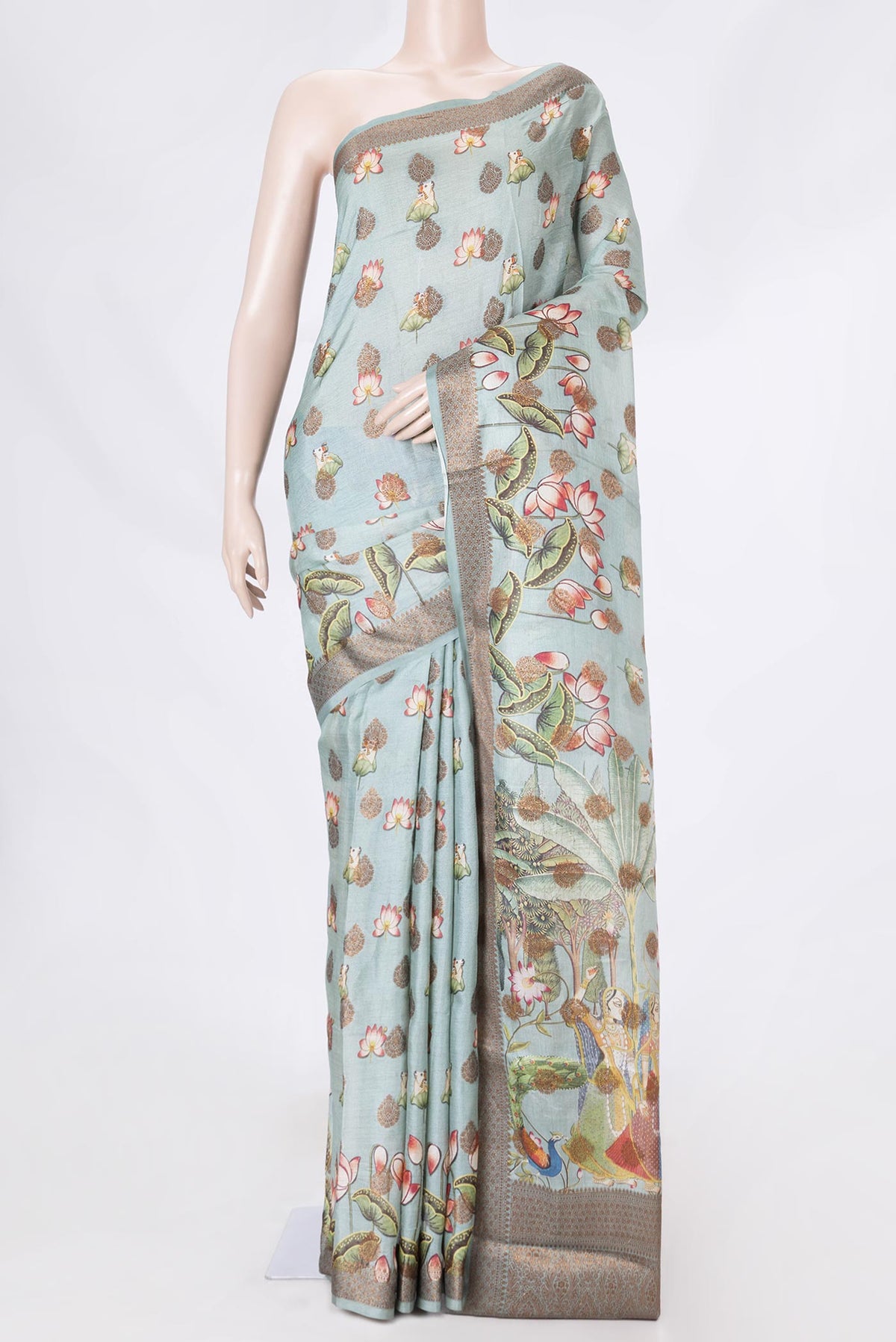 Grey Dual Tone Tussar Saree with Zari Butta on the body and Zari Border displayed on a mannequin
