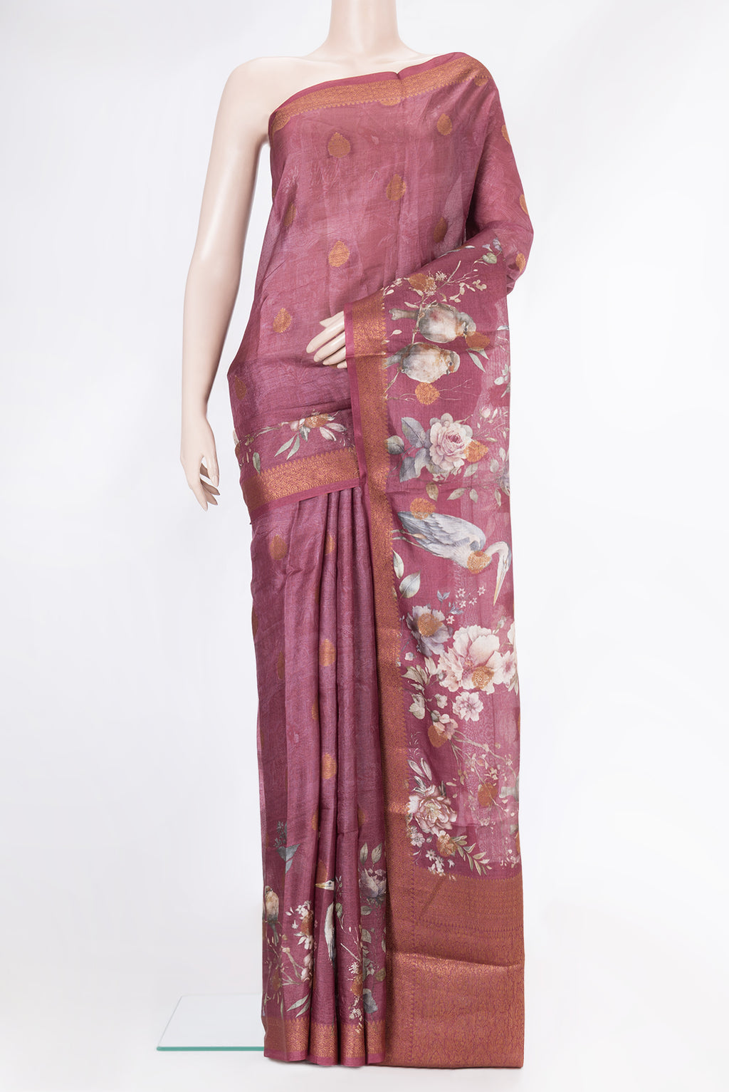 Mauve Dual Tone Tussar Silk Saree with Printed design on the body and Thread Border.  displayed on a mannequin
