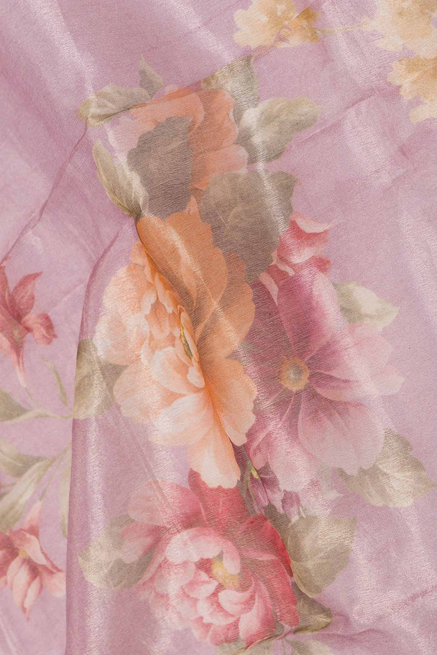 Close up of Pink Dual Tone Organza Silk Saree with Printed design on the body and Zari Border displaying folds