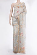 Grey Organza Saree with Floral Print on the body and Zari Border.  displayed on a mannequin