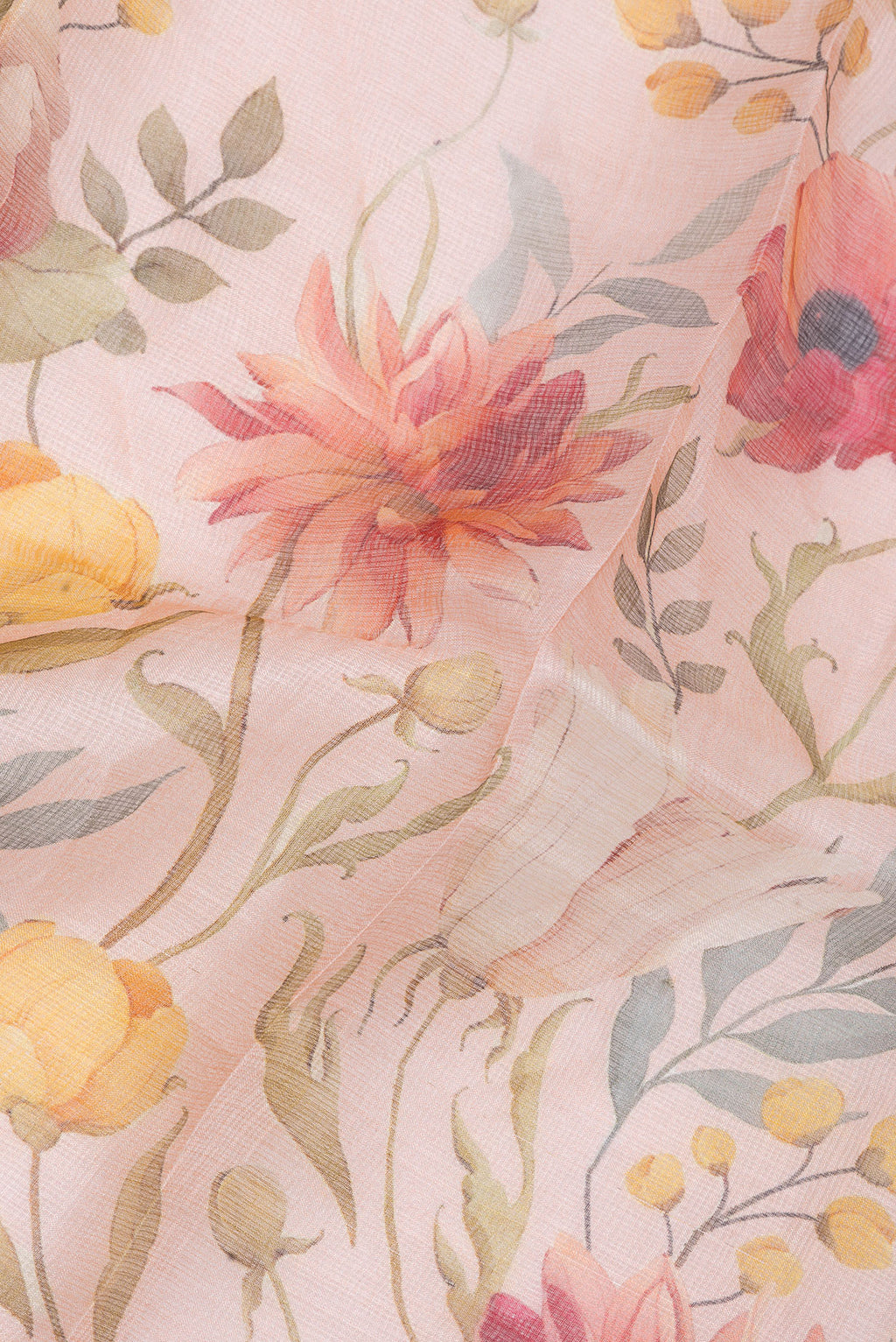 Close up of Rose Gold Kota Silk Saree with Floral Print on the body and Zari Border.  displaying folds