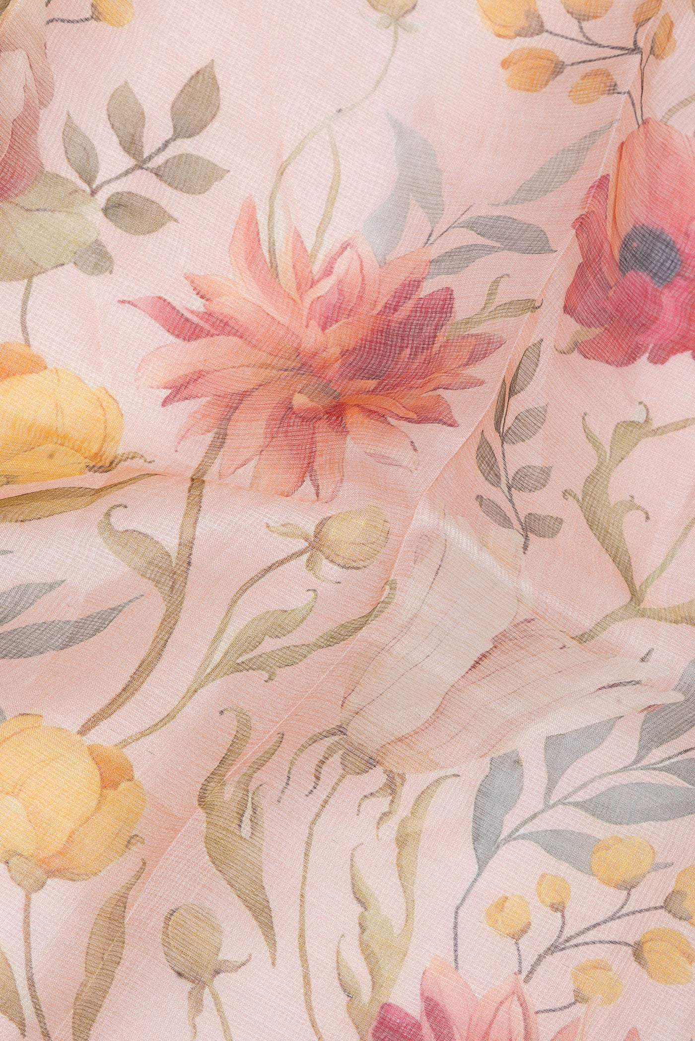 Close up of Rose Gold Kota Silk Saree with Floral Print on the body and Zari Border.  displaying folds