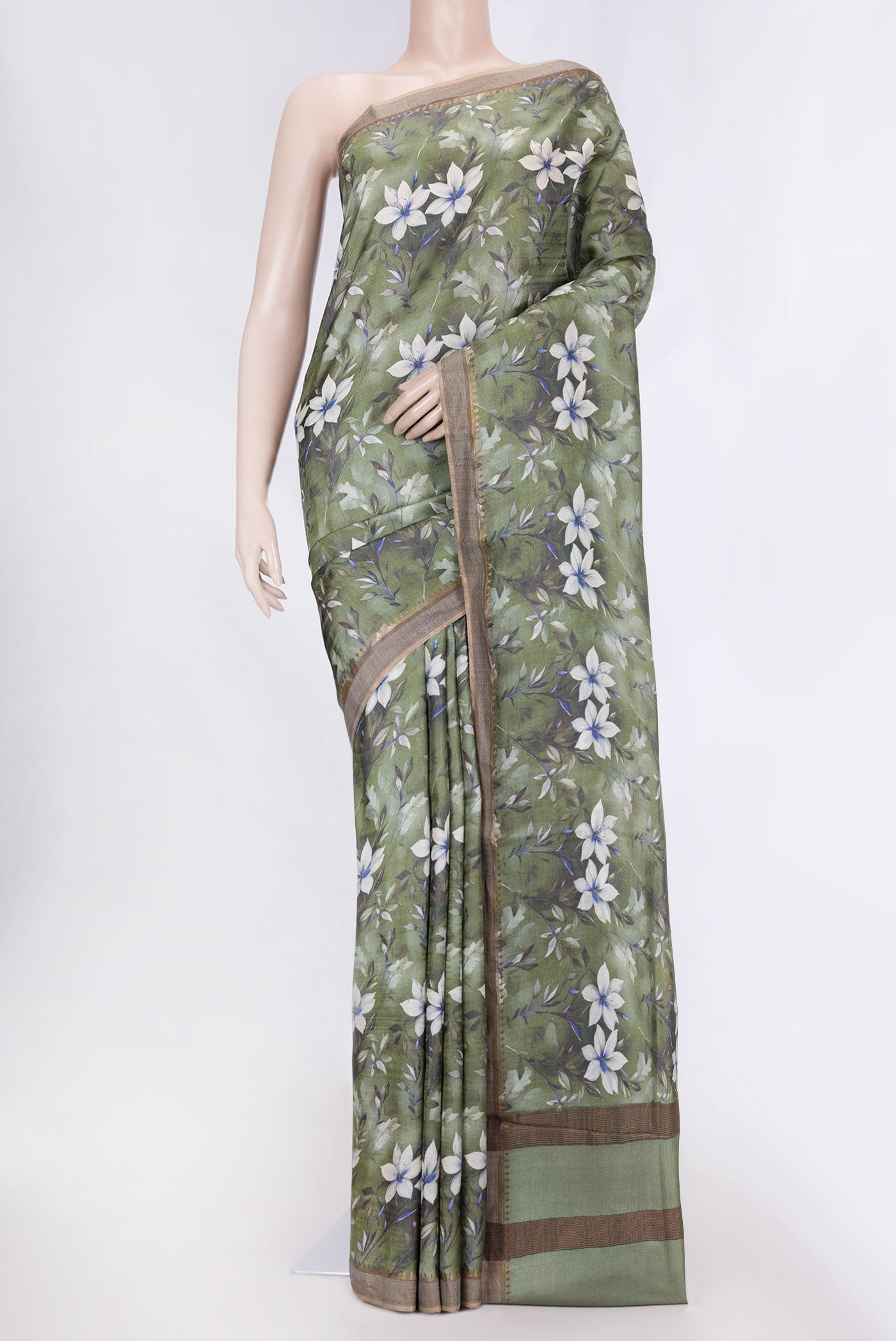 Green Dual Tone Tussar Silk Saree with Printed design on the body and Zari Border displayed on a mannequin