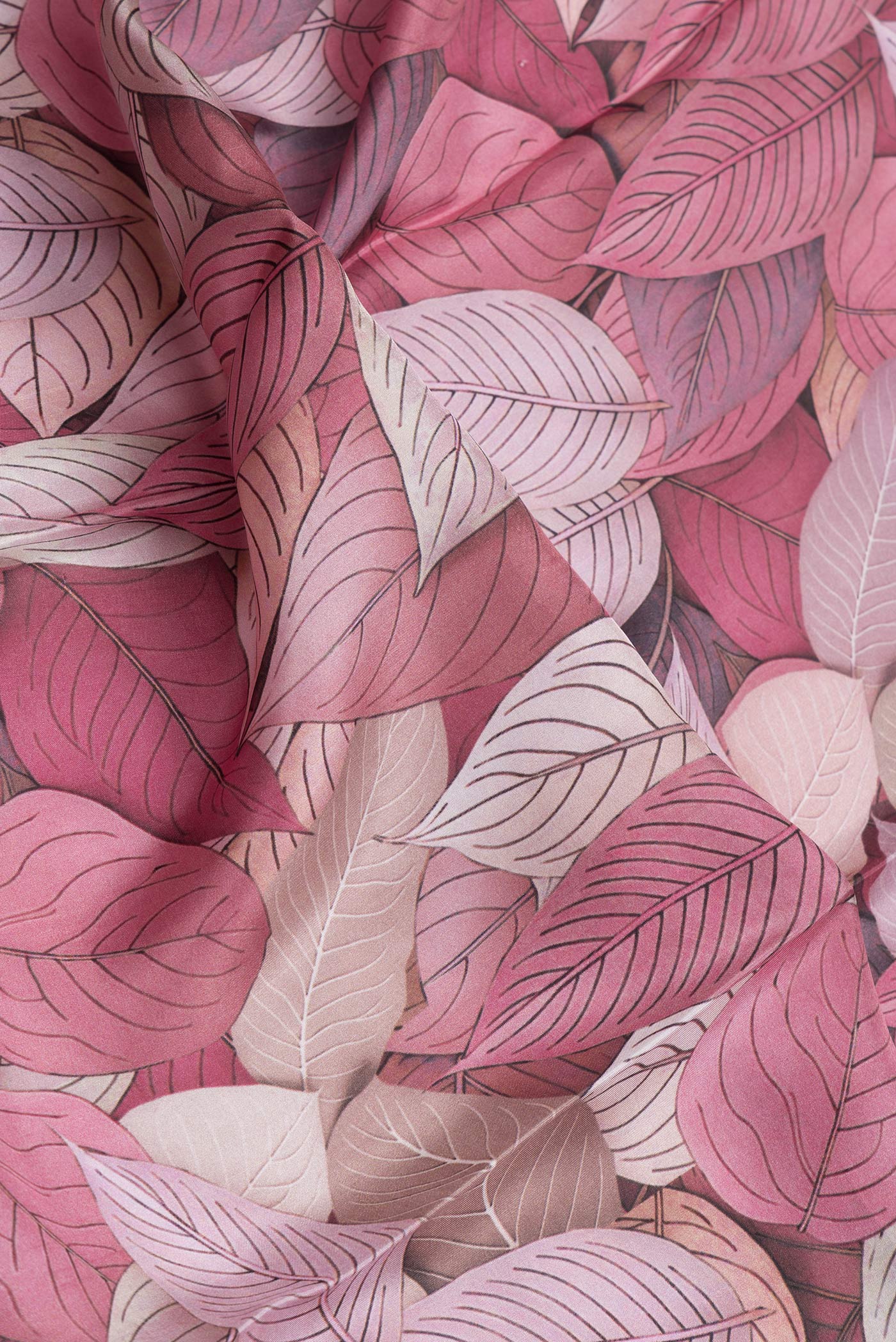 Close up of Pink Dual Tone Printed Silk Saree with Printed design on the body and Plain Border.  displaying folds