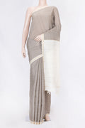 Grey Dual Tone Blended Tussar Silk Saree with Printed design on the body and Thread Border displayed on a mannequin
