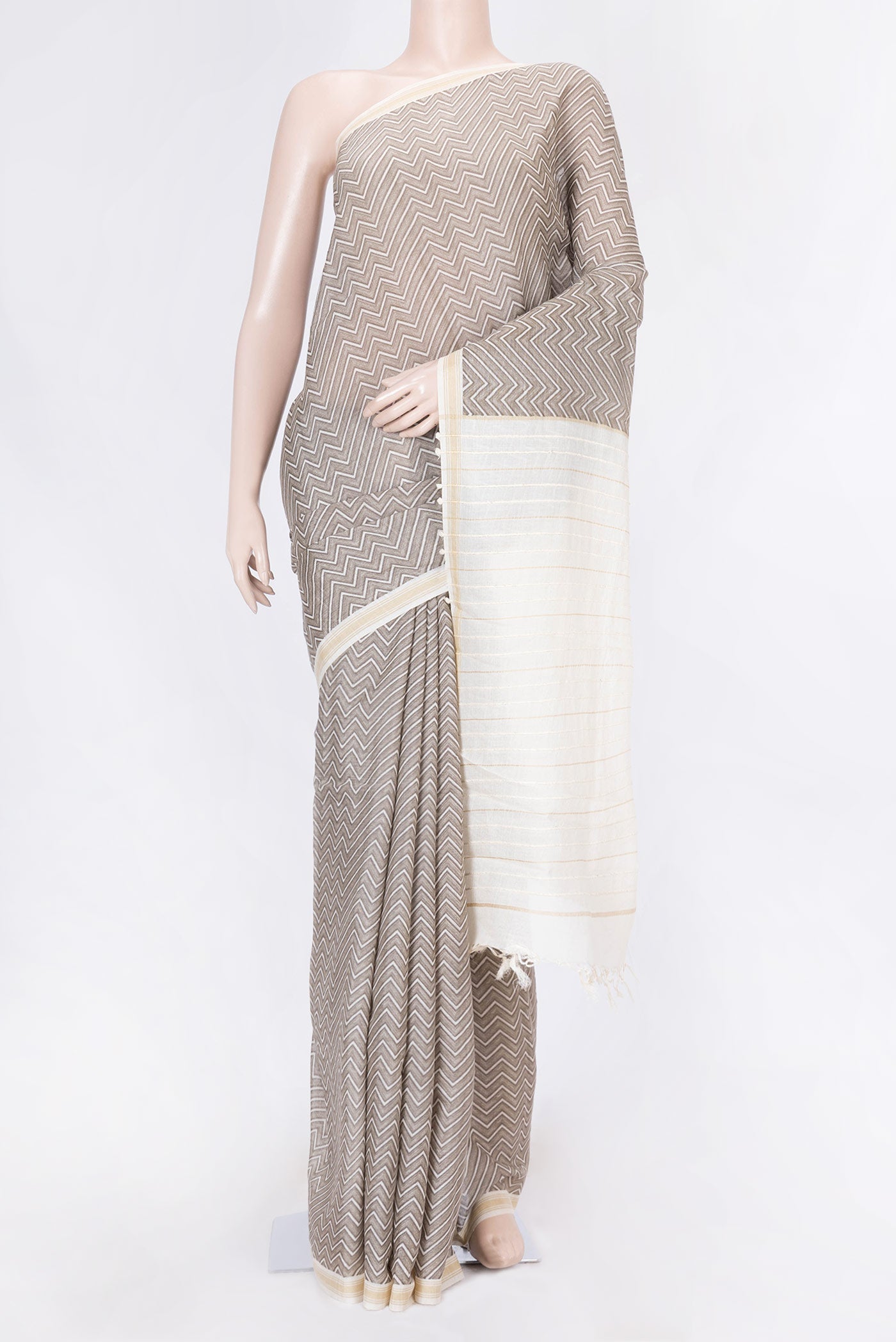 Grey Dual Tone Blended Tussar Silk Saree with Printed design on the body and Thread Border displayed on a mannequin