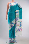 Blue Soft Silk Saree with Plain Body and Printed Border displayed on a mannequin