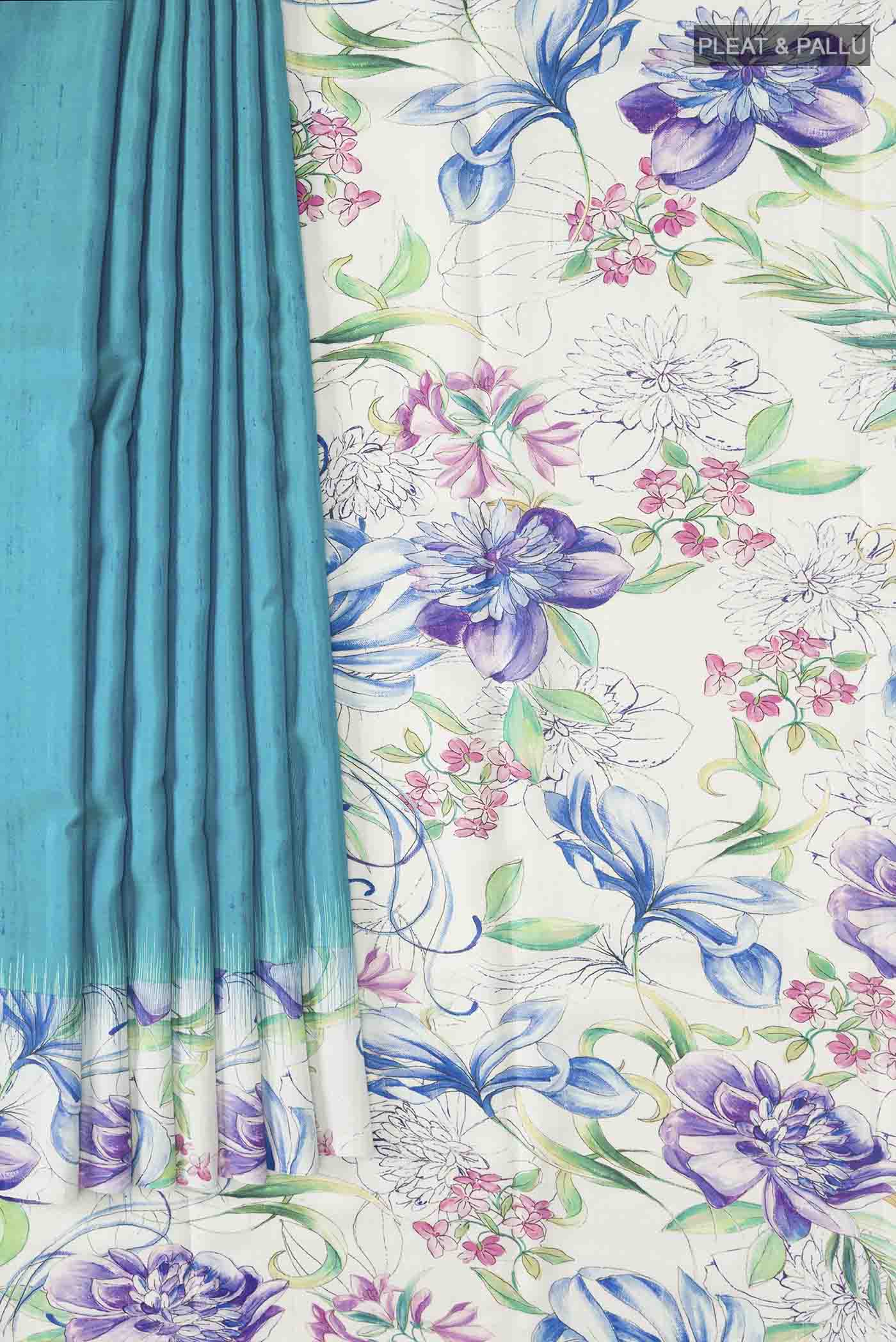 Pleats and pallu of Blue Soft Silk Saree with Plain Body and Printed Border